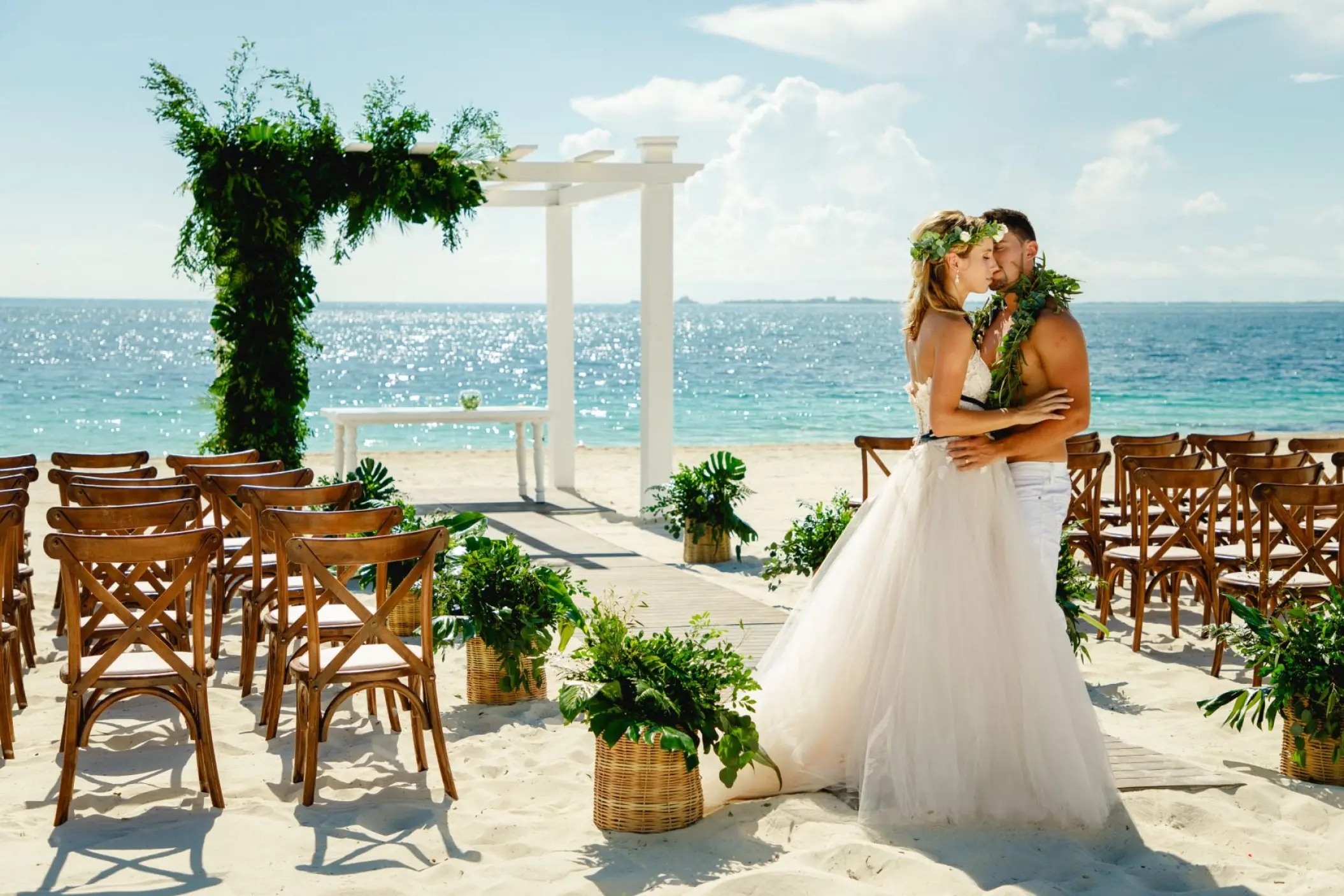 Beach ceremony setup for a couple at Grand Palladium Costa Mujeres, Cancun