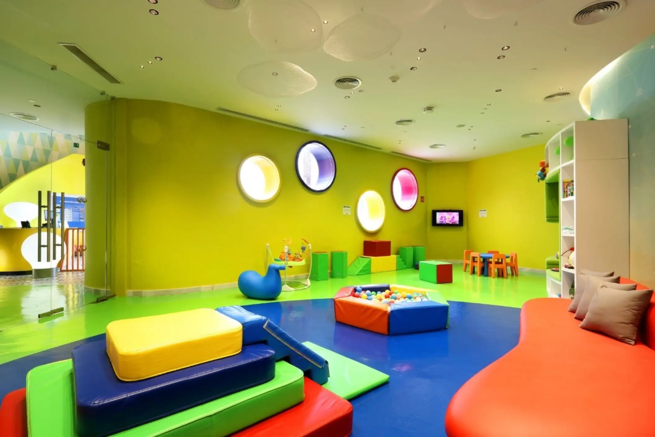 Kids playroom with colorful climbing mats and ball pit at Grand Palladium Costa Mujeres, Cancun