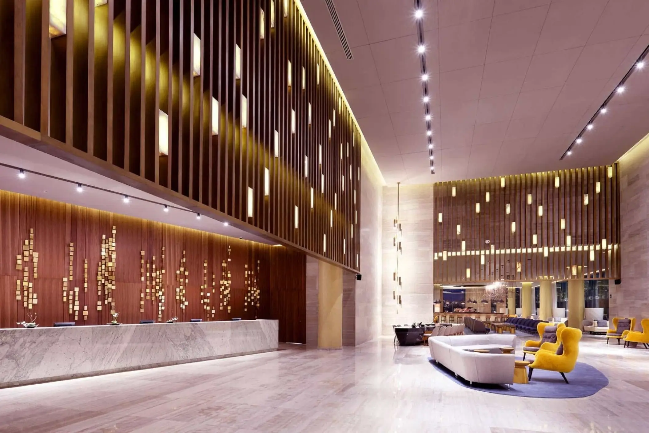 Grand Palladium Costa Mujeres lobby with modern seating and high ceilings, Cancun