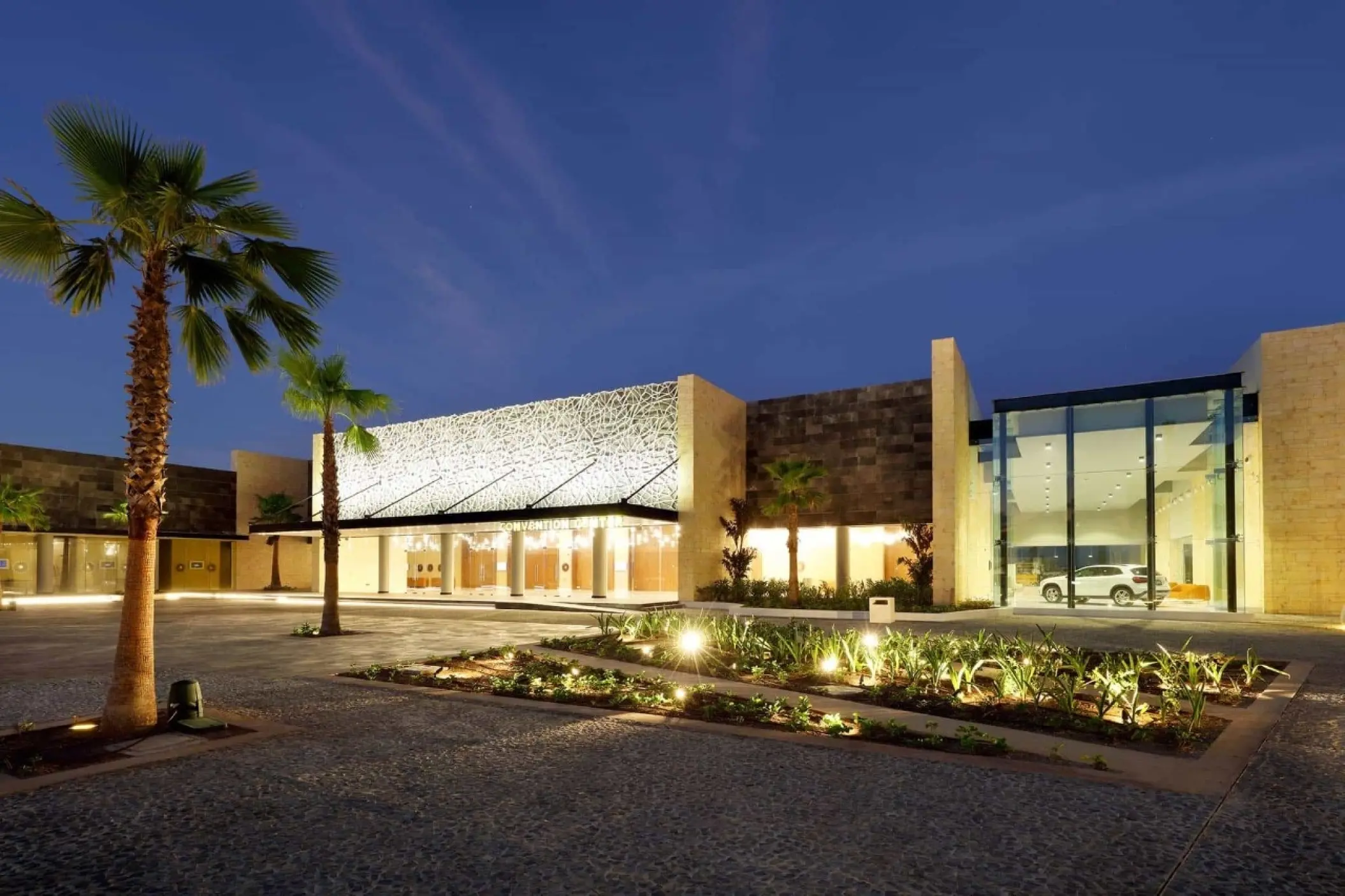 Grand Palladium Costa Mujeres main entrance and modern lobby exterior at dusk, Cancun