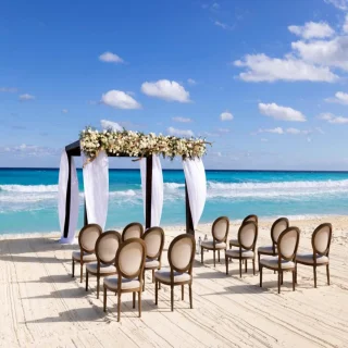 Ceremony decor on the beach wedding venue at Paradisus Cancun