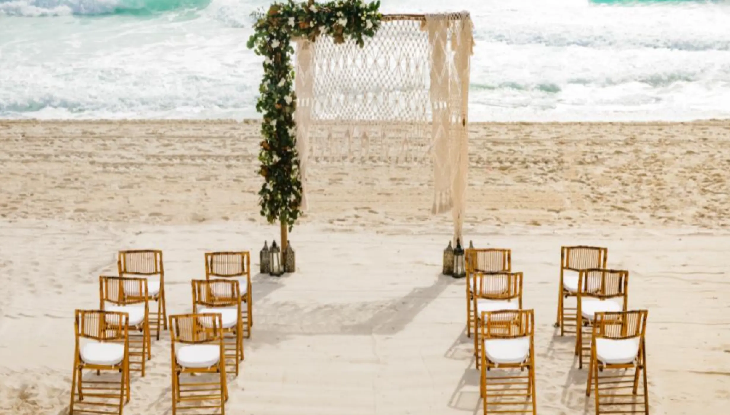 Ceremony decor on the beach wedding venue at Paradisus Cancun