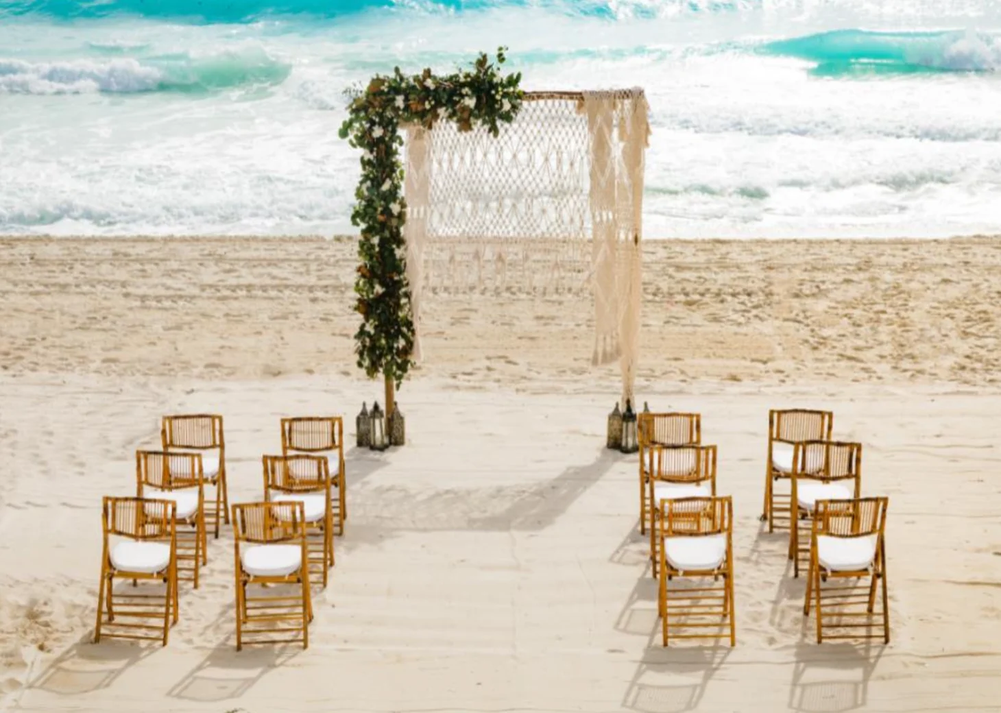 Ceremony decor on the beach wedding venue at Paradisus Cancun