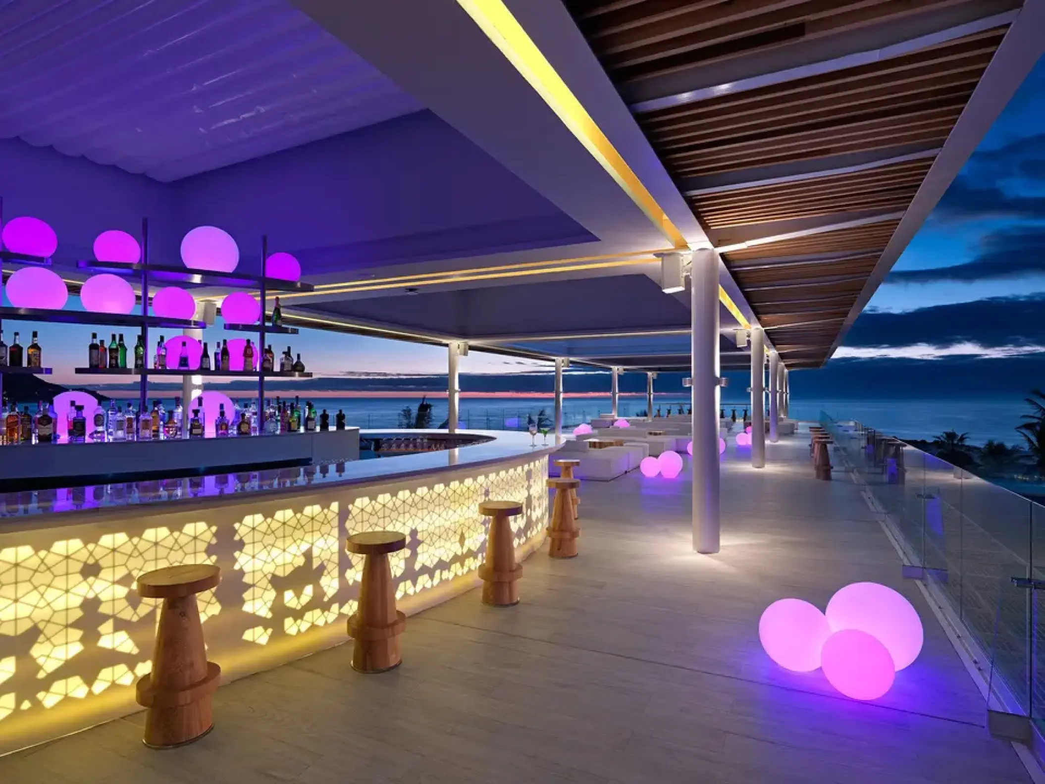 Gaby Sky Bar terrace with purple lighting at sunset, Paradisus Los Cabos