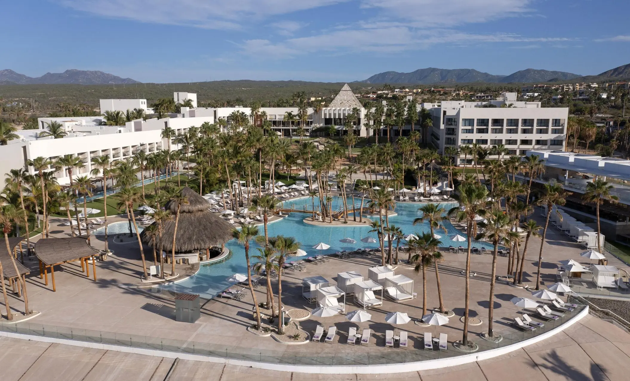Paradisus Los Cabos main pool area and grounds with palm trees, Cabo San Lucas