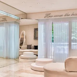 Bridal suite with mirrors and white seating at Paradisus La Perla, Playa Del Carmen