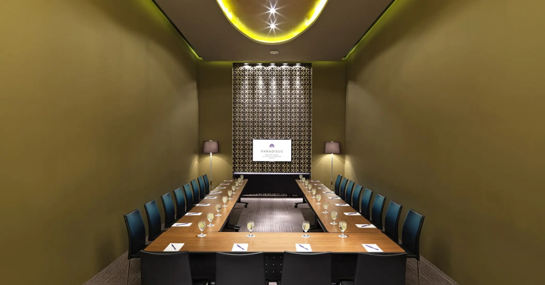 U-shaped conference table and seating in a meeting room at Paradisus La Perla, Playa Del Carmen