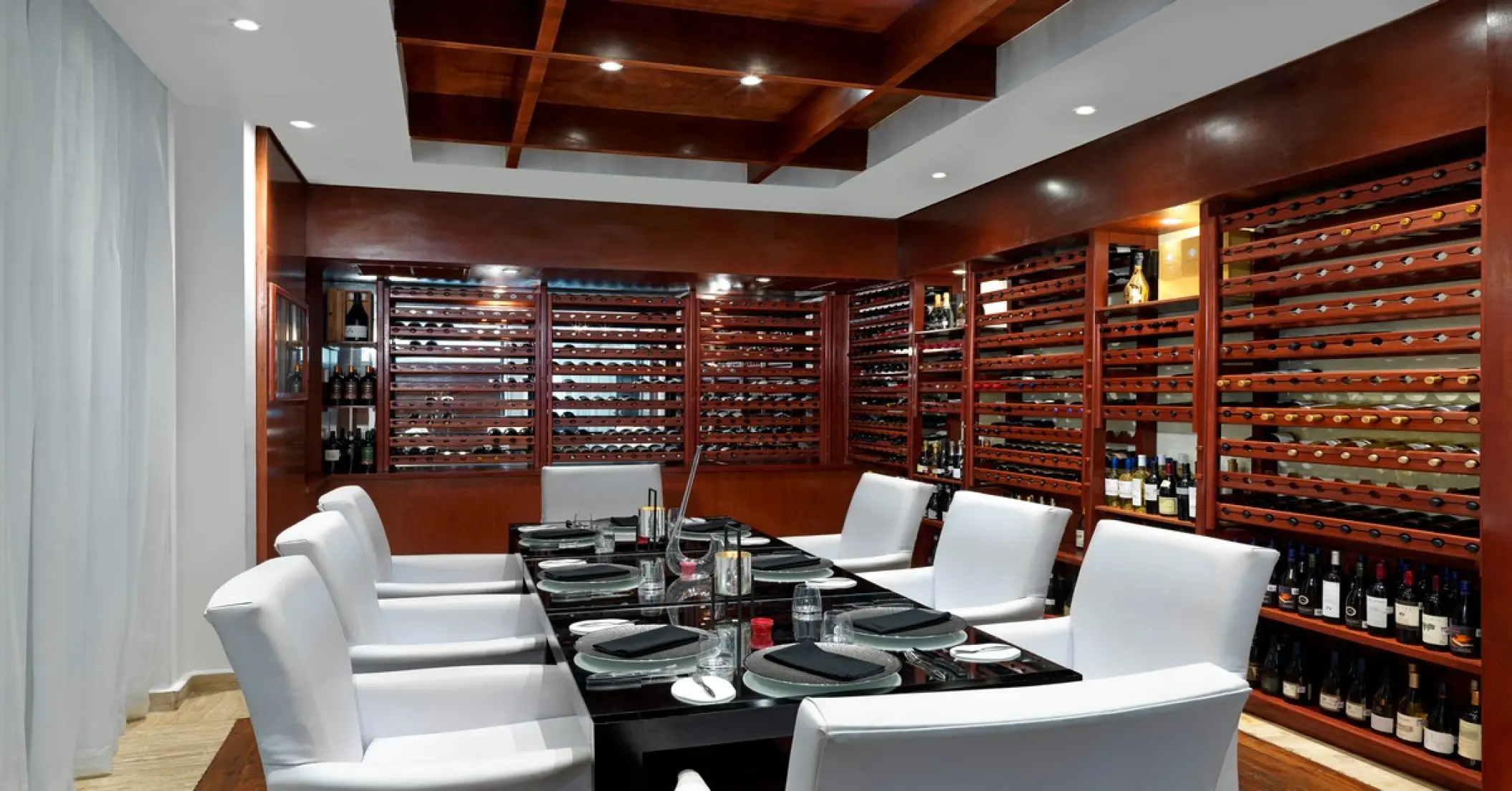 Private dining table at the Sal Steak Cave wine cellar in Paradisus Cancun, Cancun