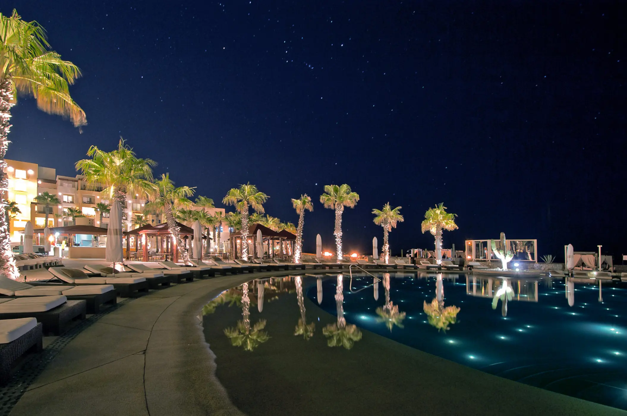 Night views on the main pool at Pueblo Bonito Pacifica Golf & Spa Resort