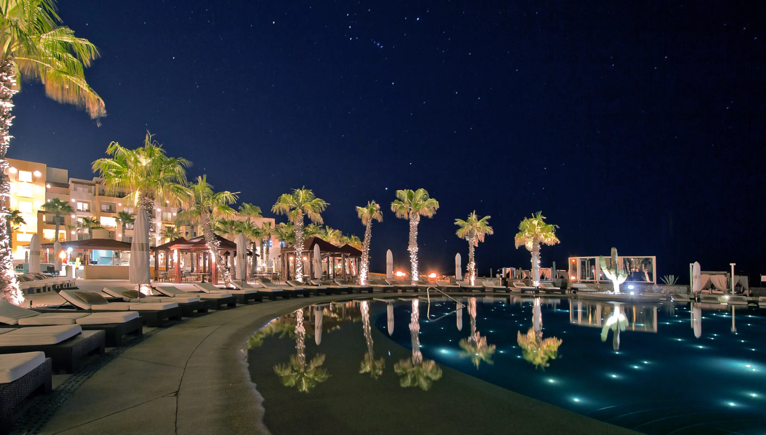 Night views on the main pool at Pueblo Bonito Pacifica Golf & Spa Resort