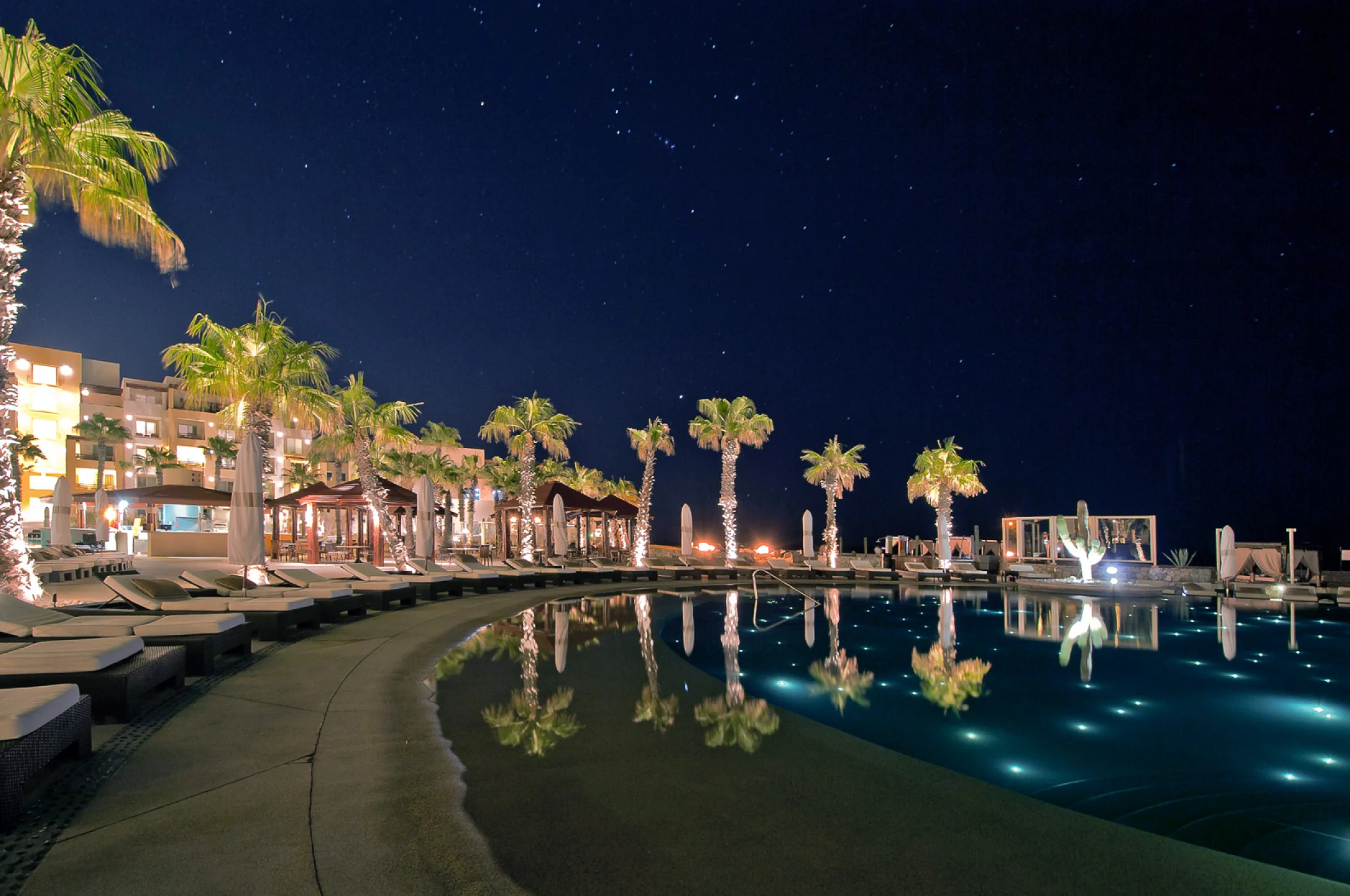 Night views on the main pool at Pueblo Bonito Pacifica Golf & Spa Resort