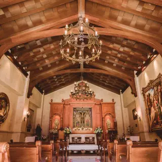 Traditional chapel wedding ceremony venue with wooden beams at Pueblo Bonito Sunset Beach, Cabo San Lucas