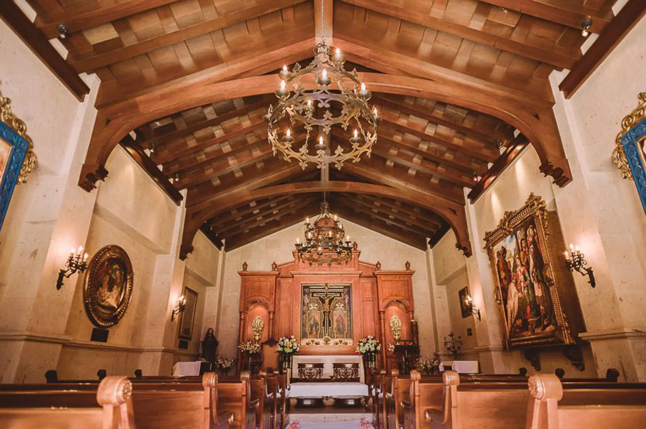 Traditional chapel wedding ceremony venue with wooden beams at Pueblo Bonito Sunset Beach, Cabo San Lucas