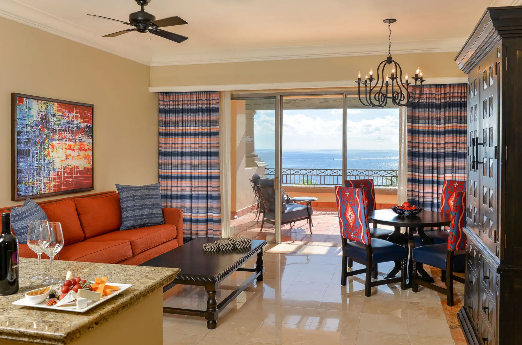 Suite living area with ocean view terrace at Pueblo Bonito Sunset Beach, Cabo San Lucas
