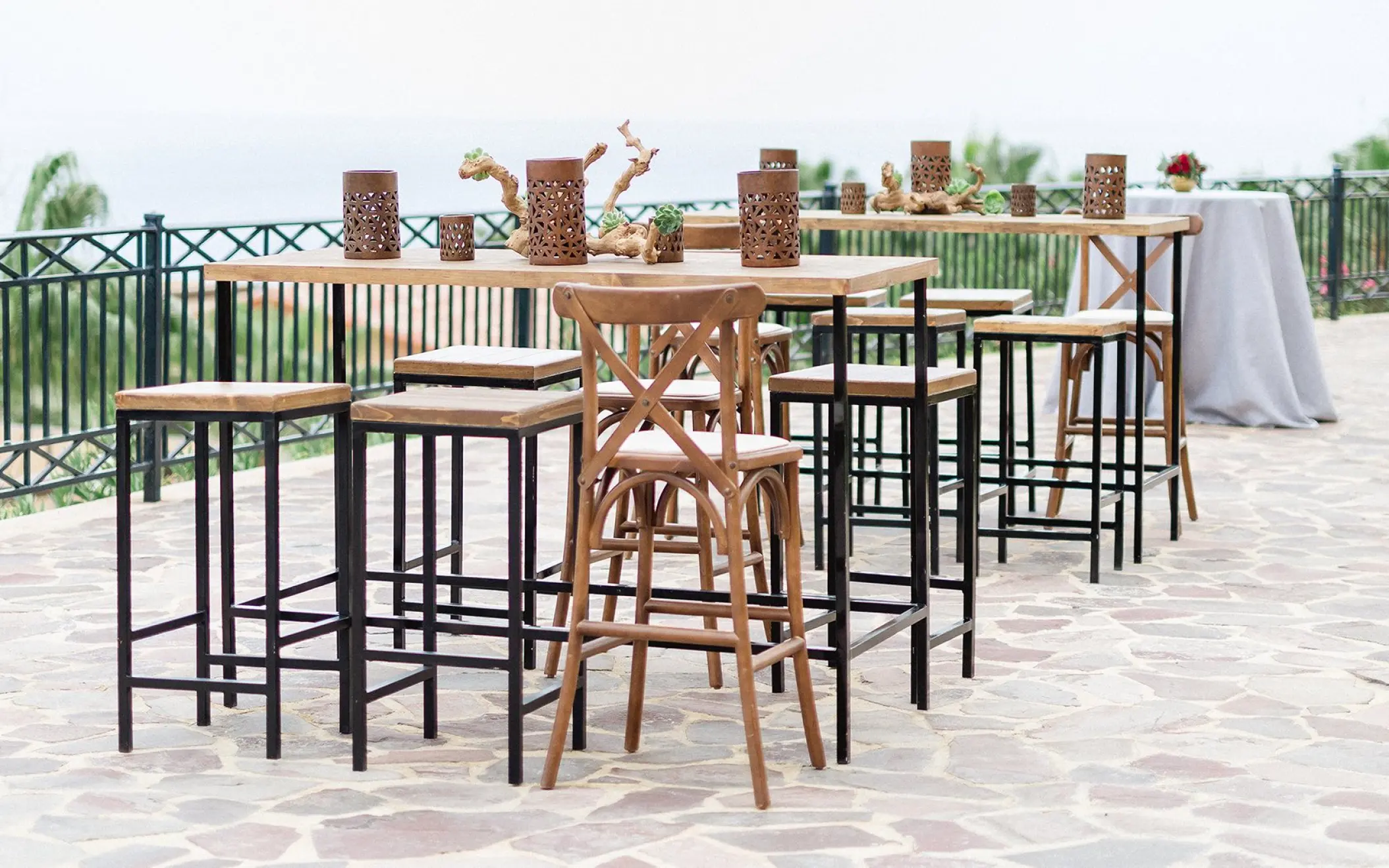 Outdoor wedding reception cocktail setup at Pueblo Bonito Sunset Beach, Cabo San Lucas