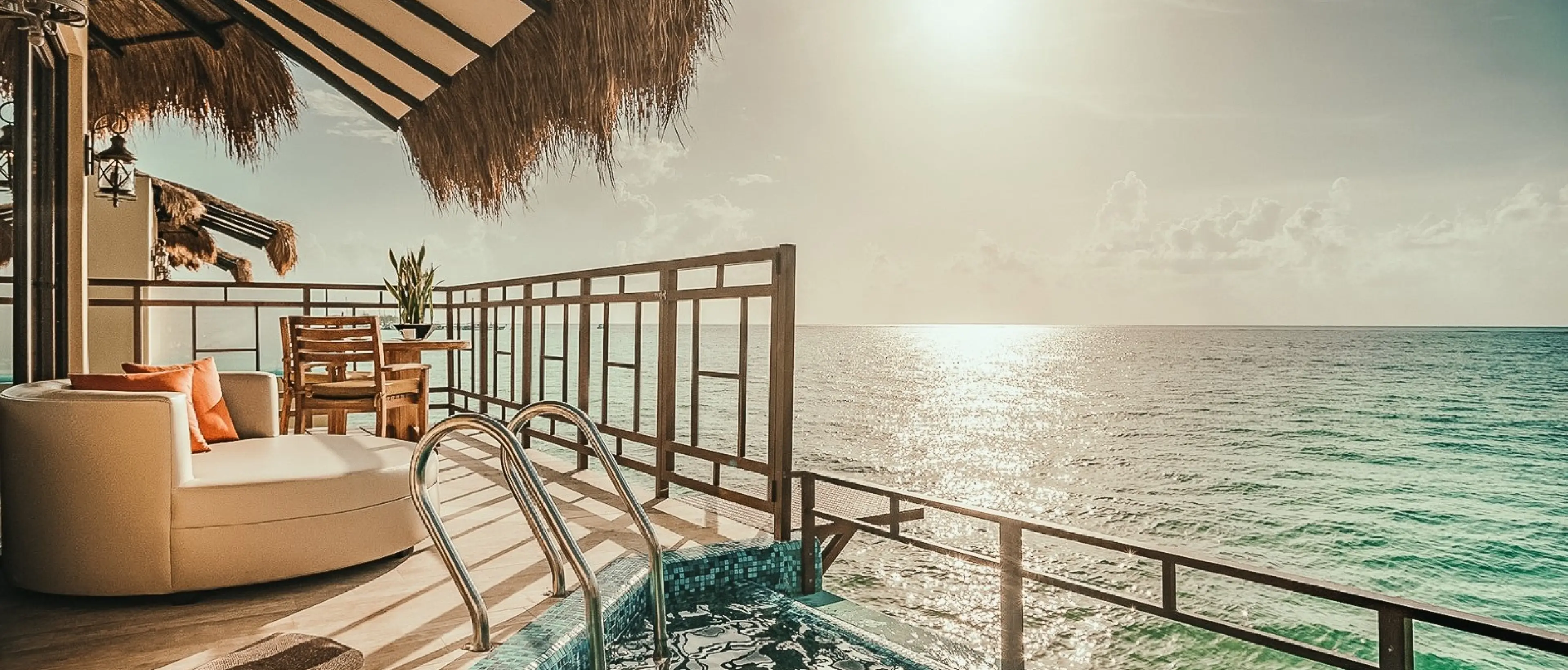 Private terrace with a plunge pool overlooking the ocean at a destination wedding resort