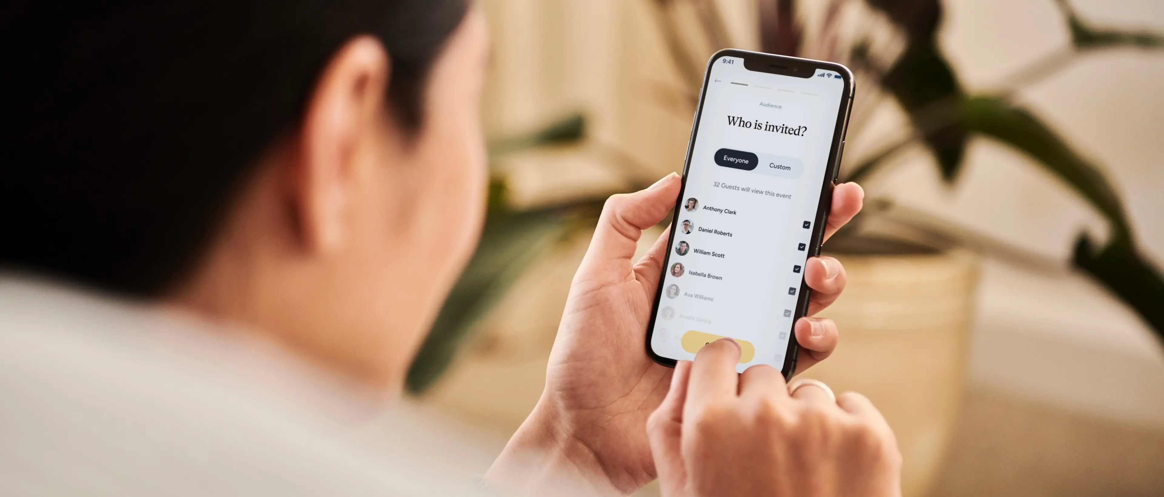 Close-up of a person using a mobile app on their smartphone