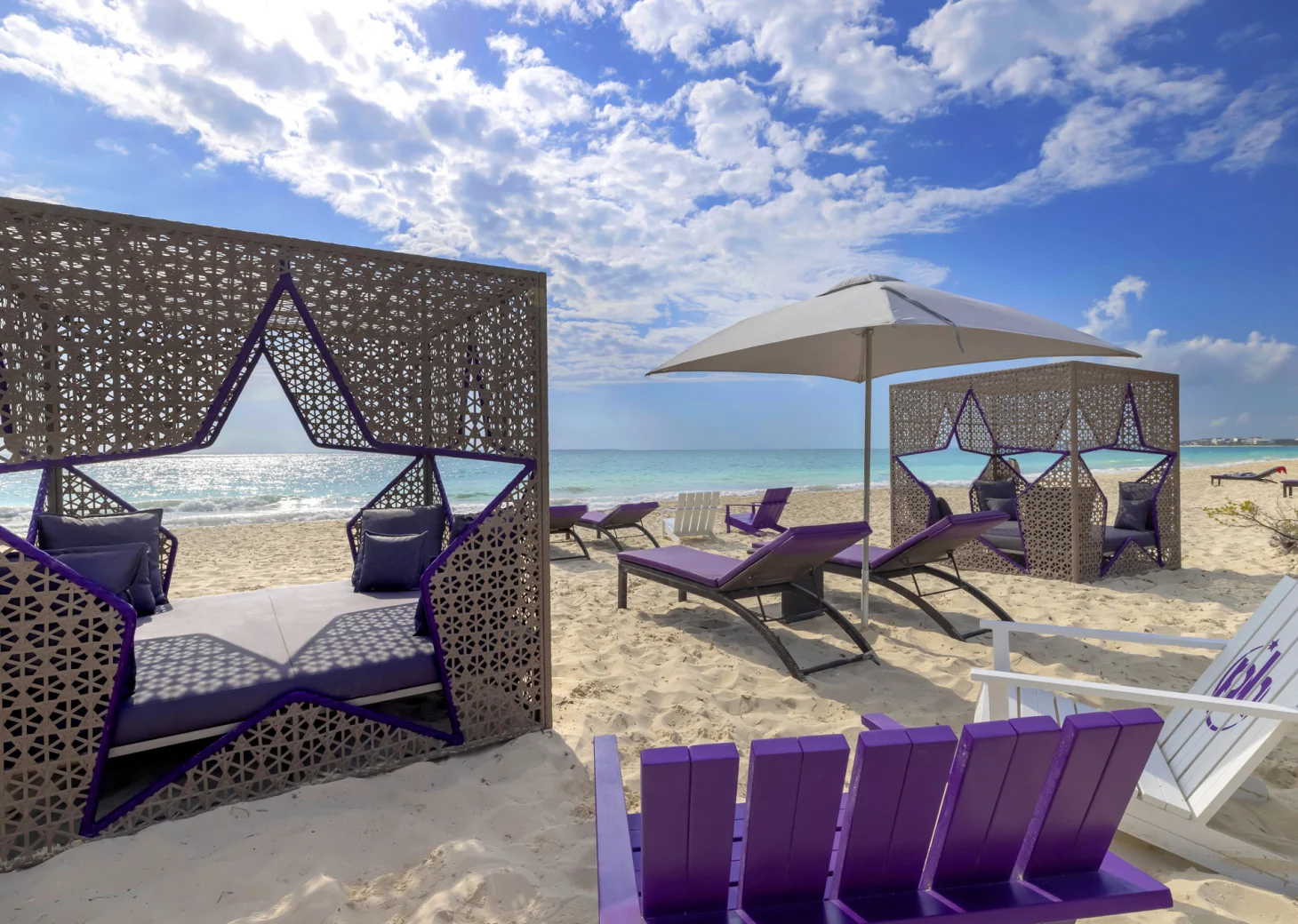 Planet Hollywood Cancun beach wth daybeds and lounge chairs