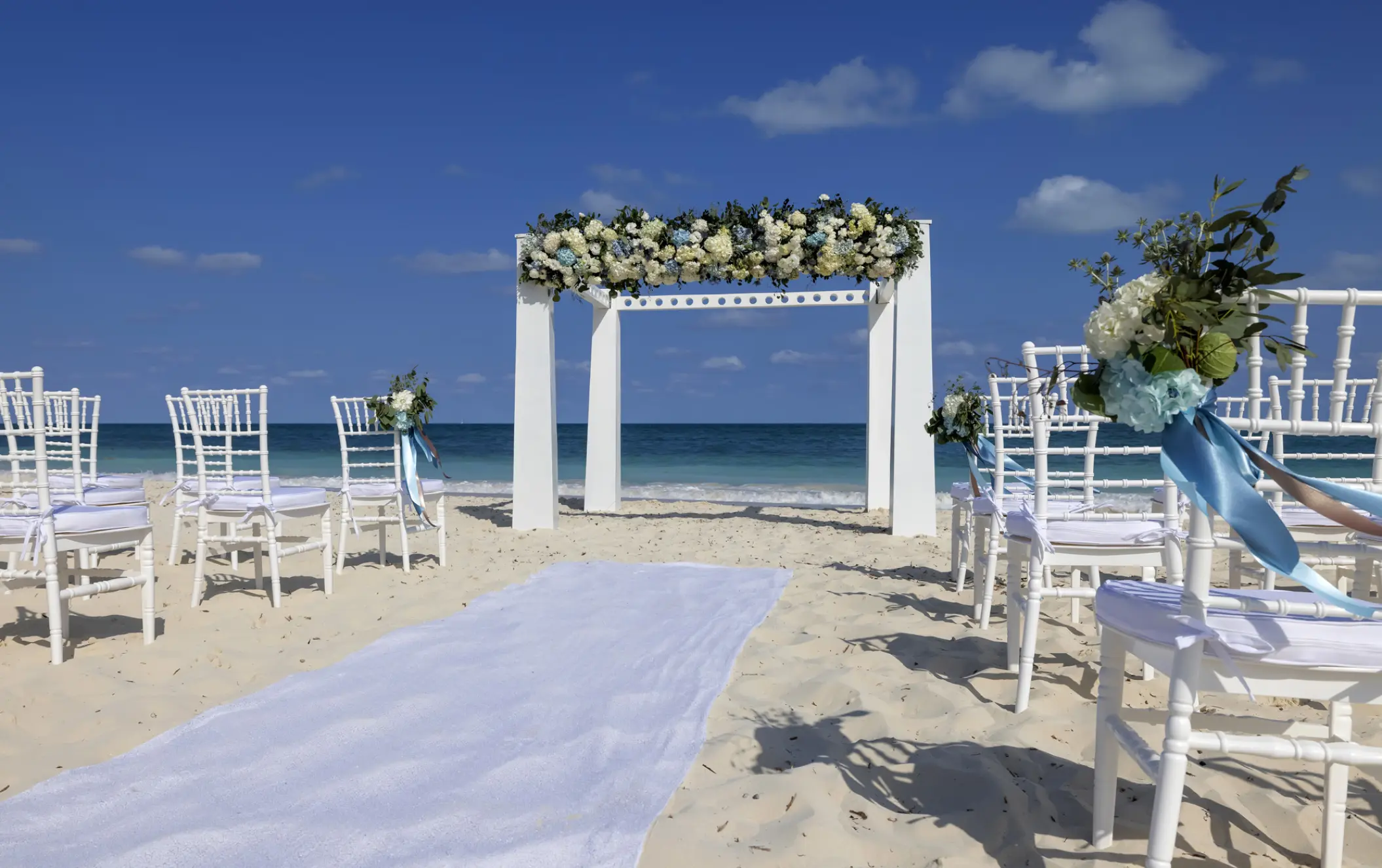 Beachfront wedding ceremony setup at Planet Hollywood Adult Scene, Cancun