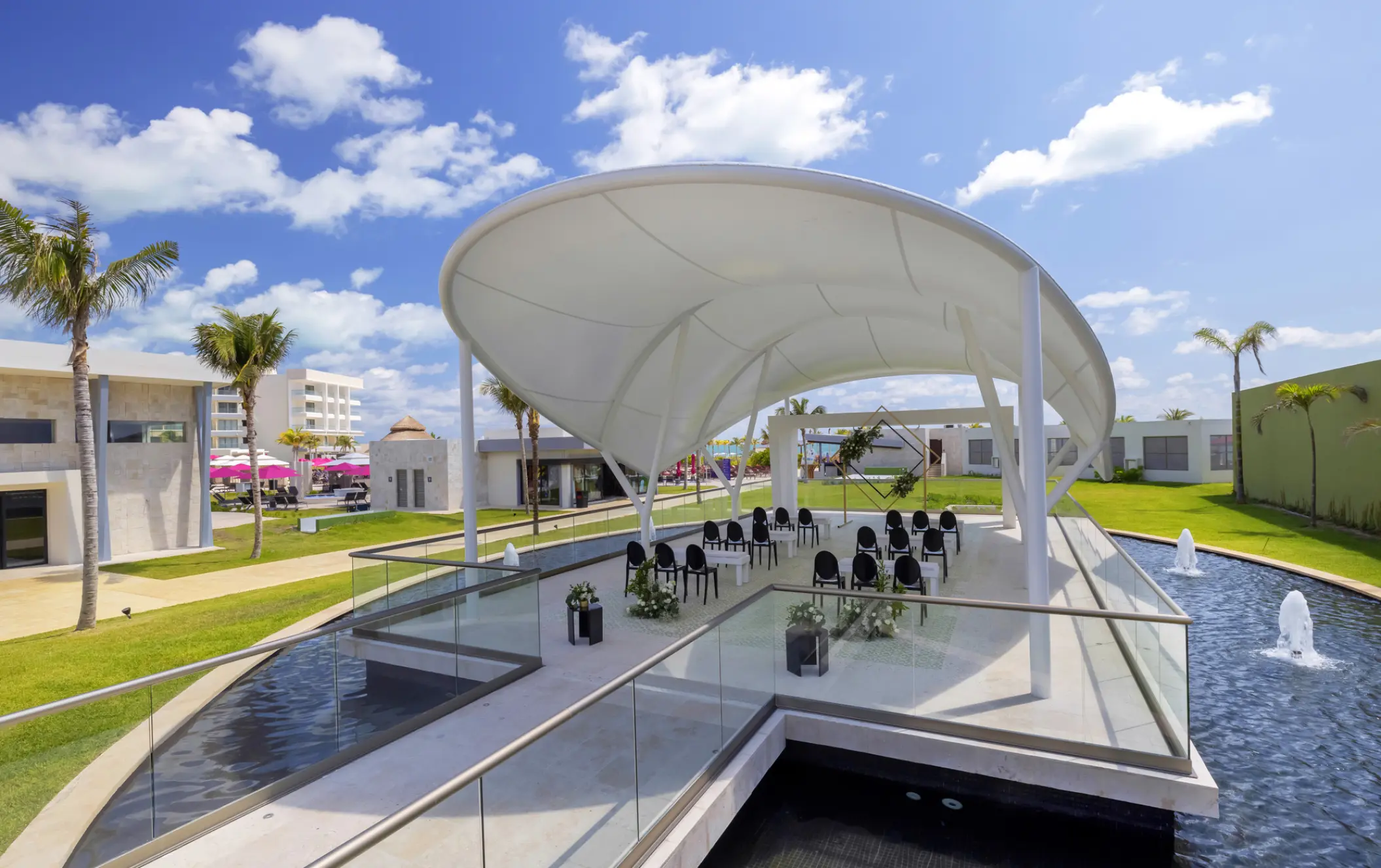Palm Pavilion wedding ceremony setup under a white canopy at Planet Hollywood Cancun