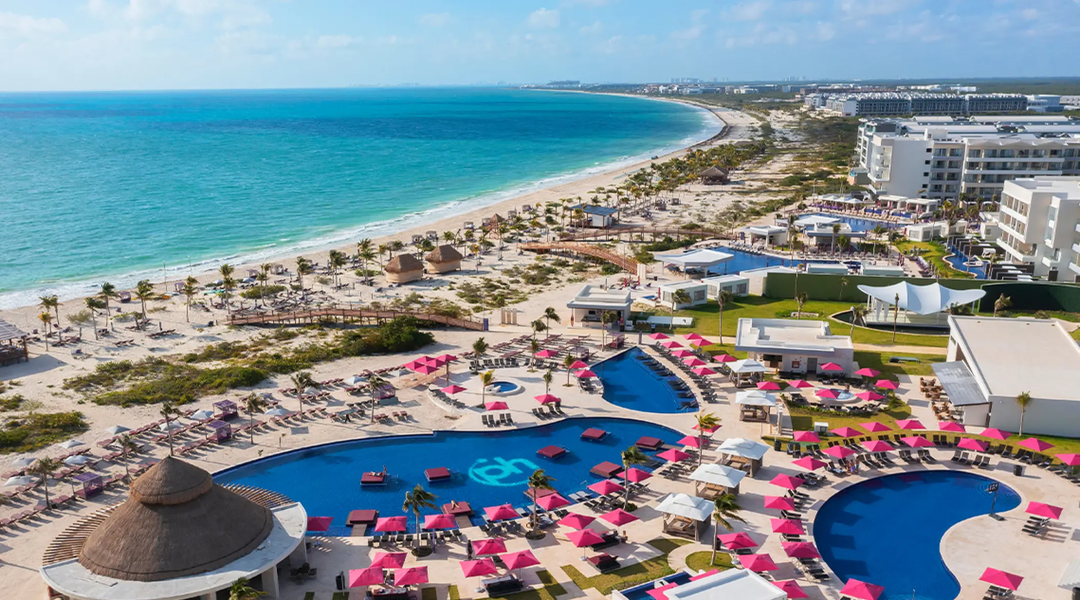 Aerial view of swimming pools and beach at Planet Hollywood Cancun