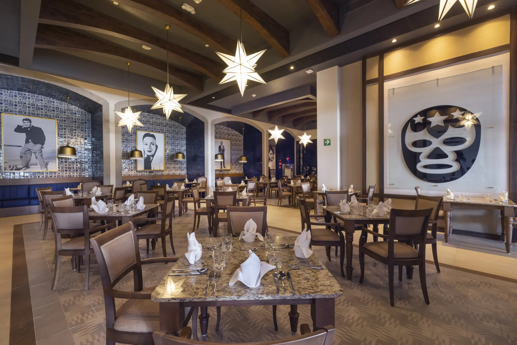 La Cocina restaurant interior with star-shaped pendant lights at Planet Hollywood Cancun