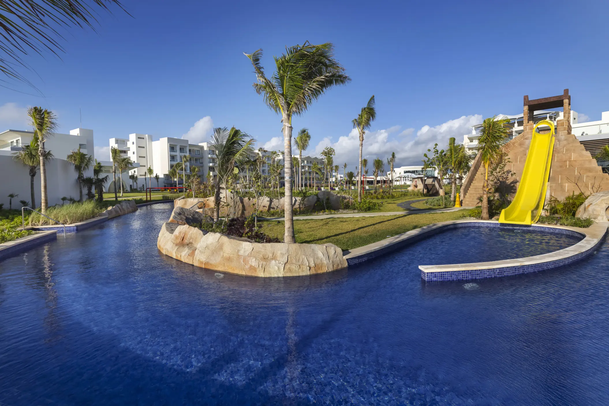 Lazy river and yellow water slide at Planet Hollywood Cancun