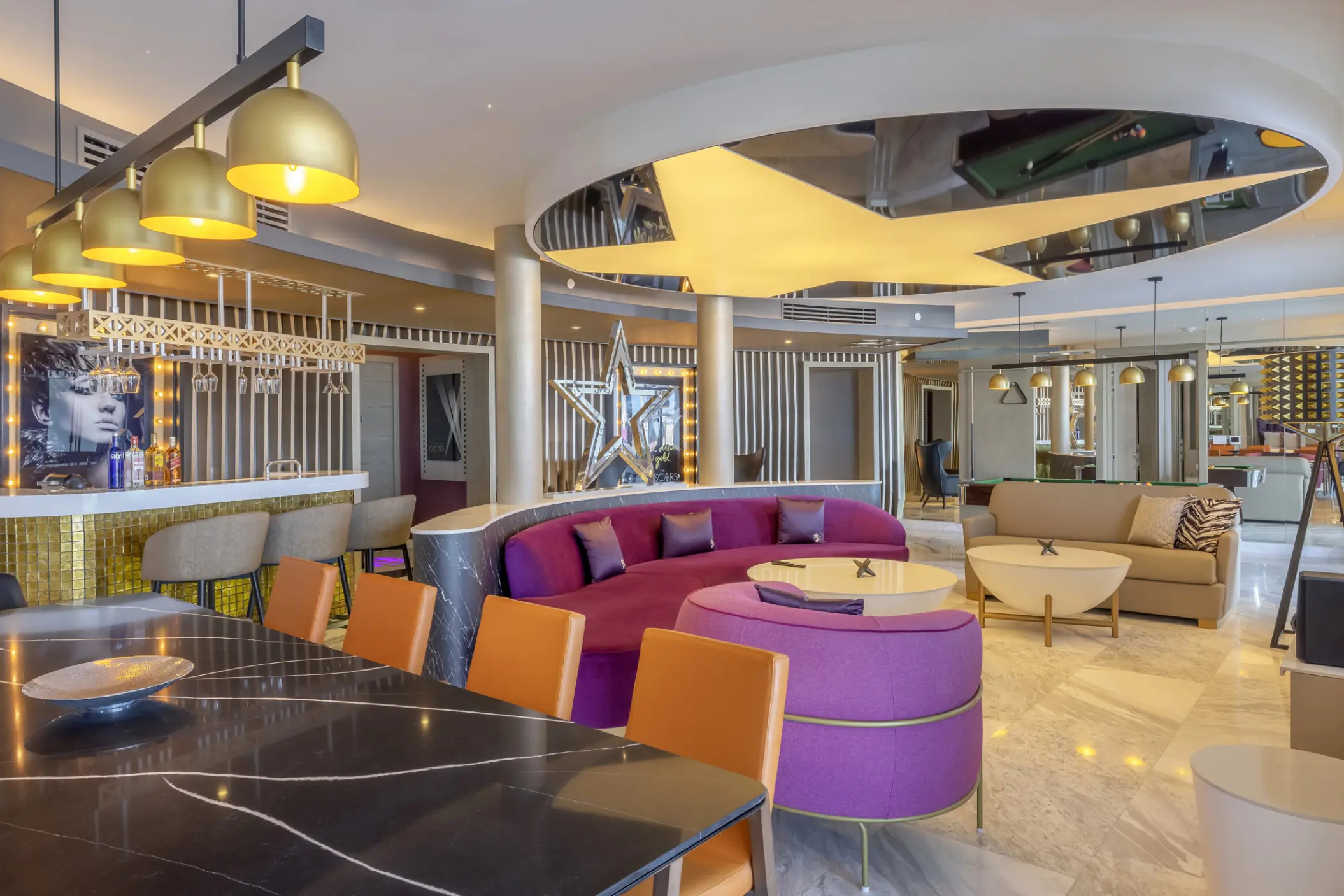 Modern suite living area with purple sofa and star ceiling feature at Planet Hollywood Cancun, Cancun