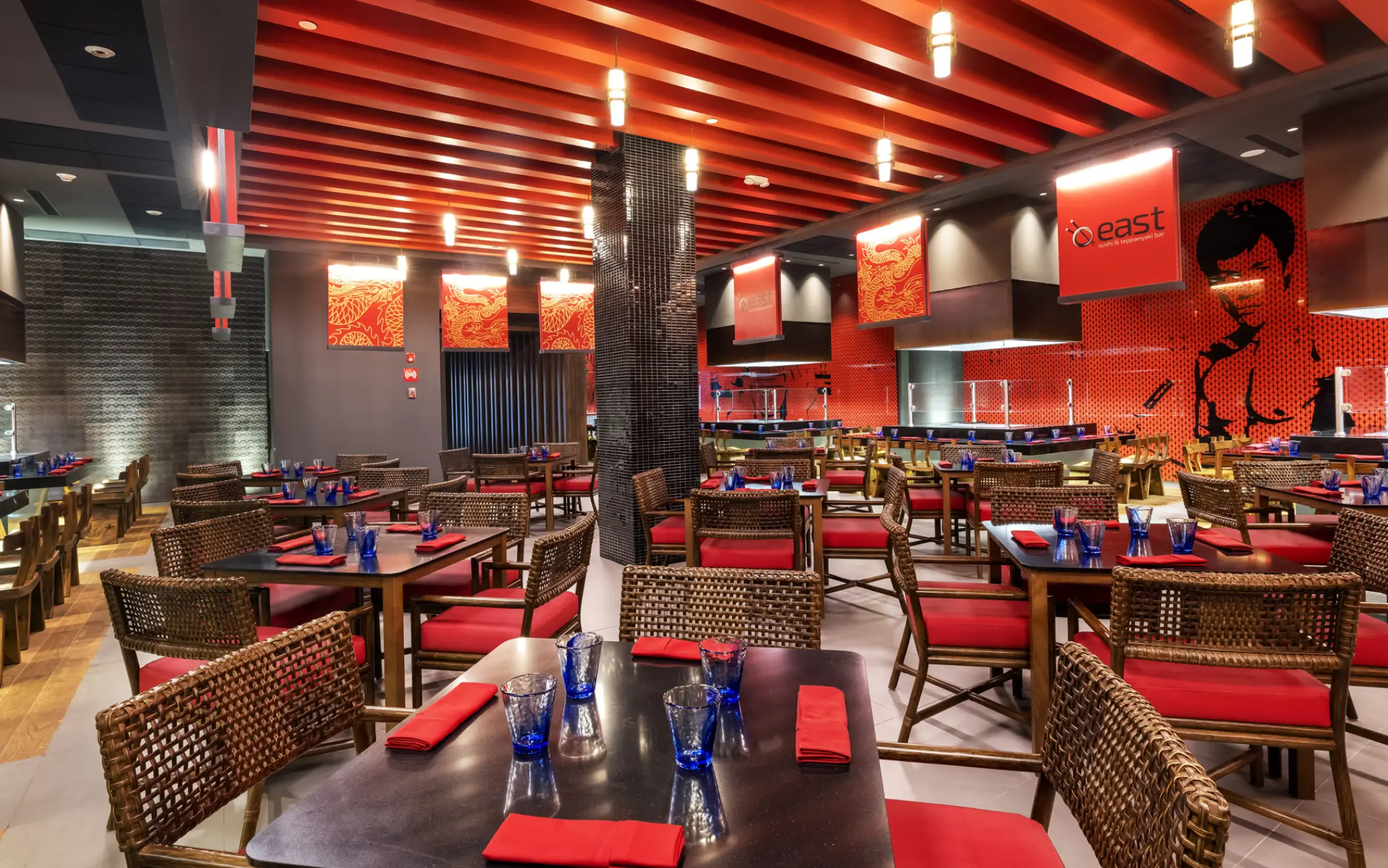 East Sushi & Teppanyaki restaurant with red and black decor at Planet Hollywood Cancun