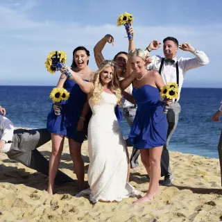 Wedding party celebrating on the beach at Playa Grande Resort, Cabo San Lucas