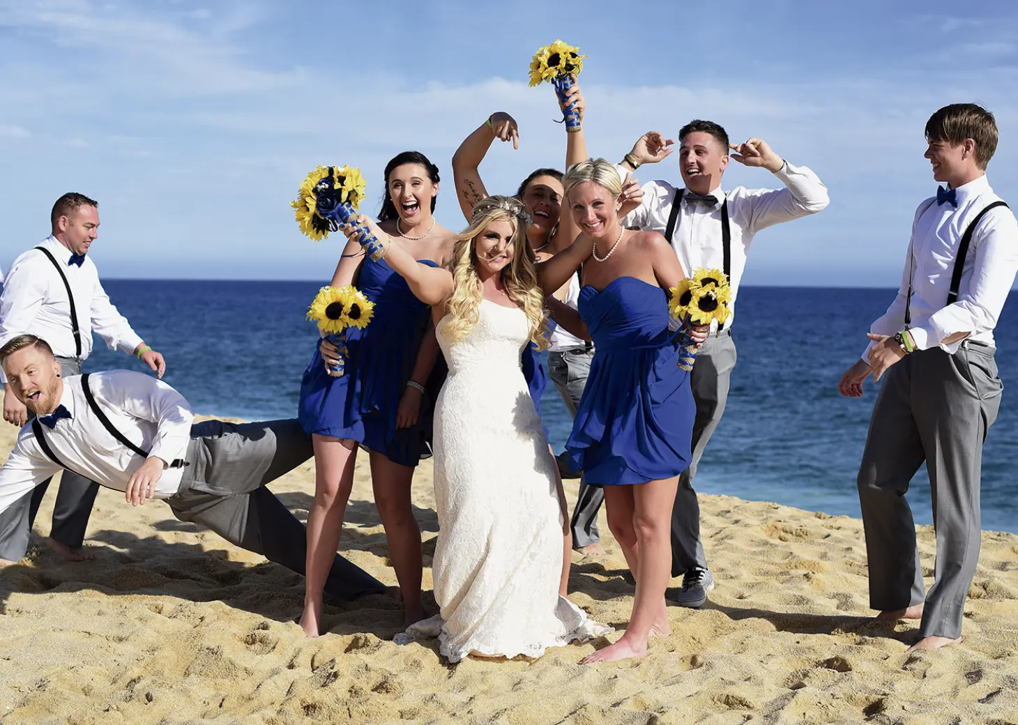 Wedding party celebrating on the beach at Playa Grande Resort, Cabo San Lucas