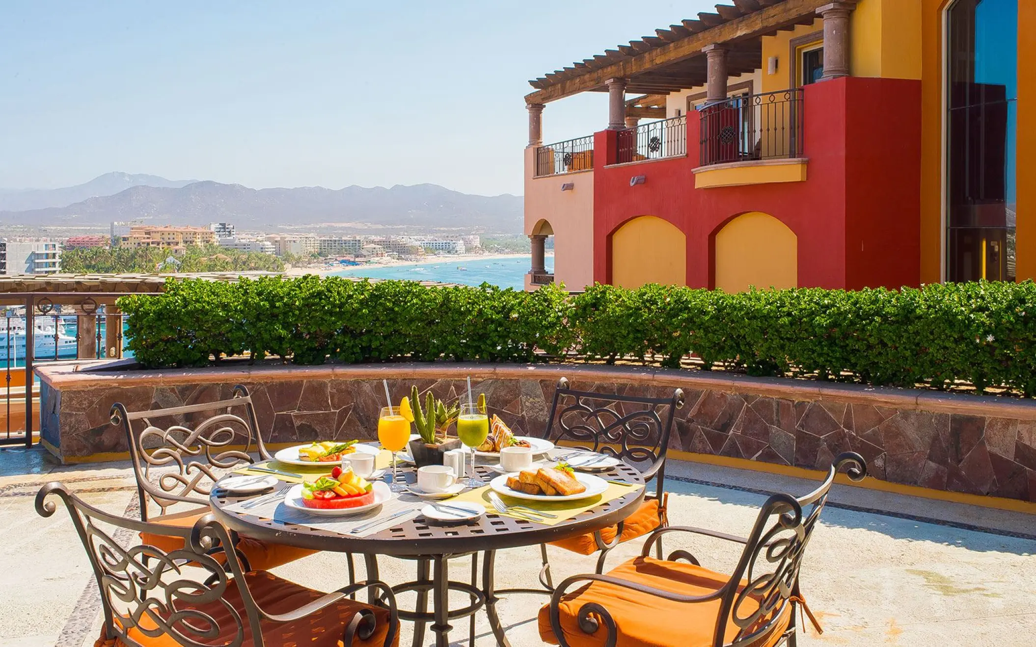 Outdoor terrace breakfast with ocean views at Playa Grande Resort, Cabo San Lucas