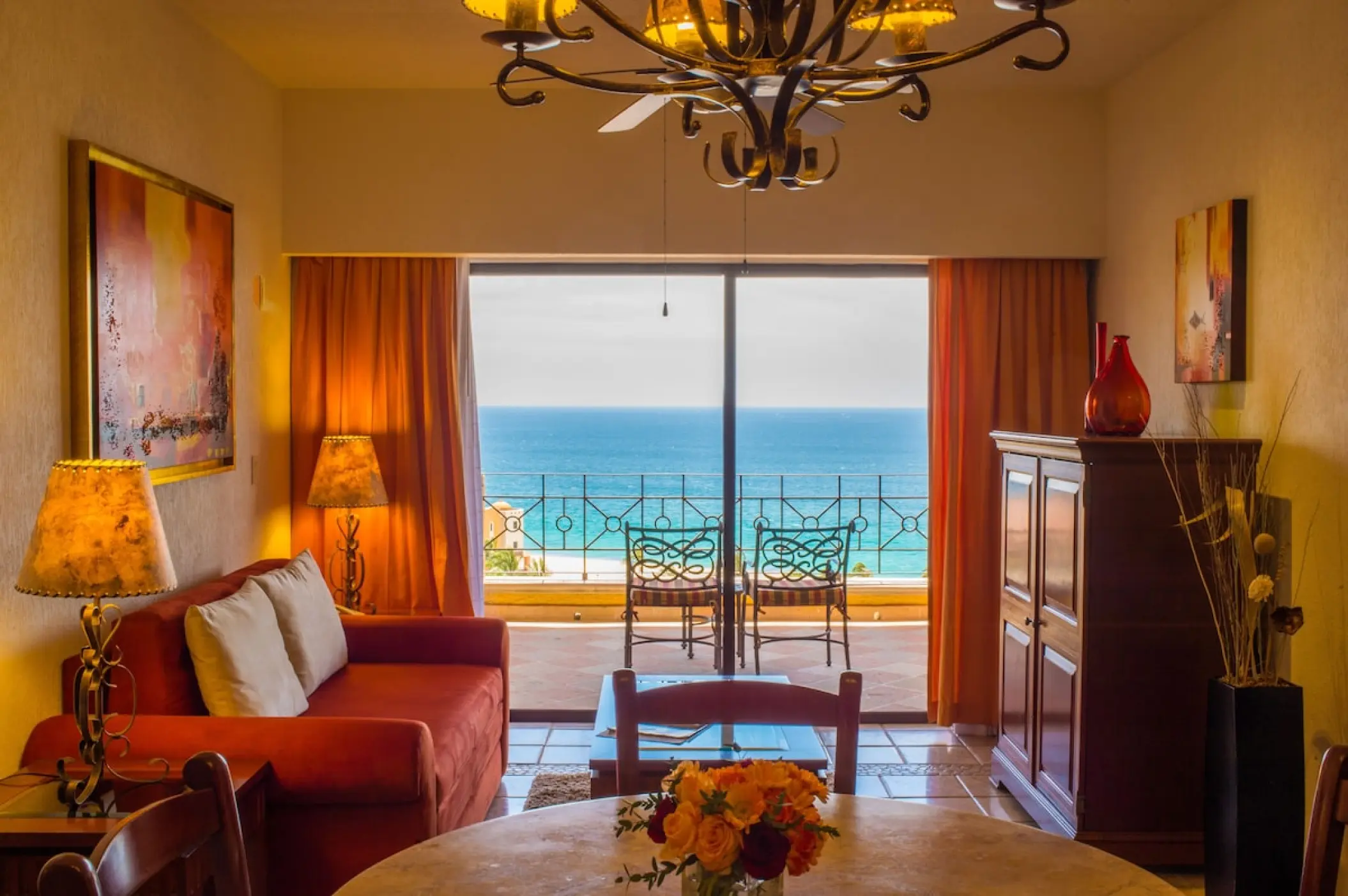 Playa Grande Resort suite living room with ocean view balcony, Cabo San Lucas