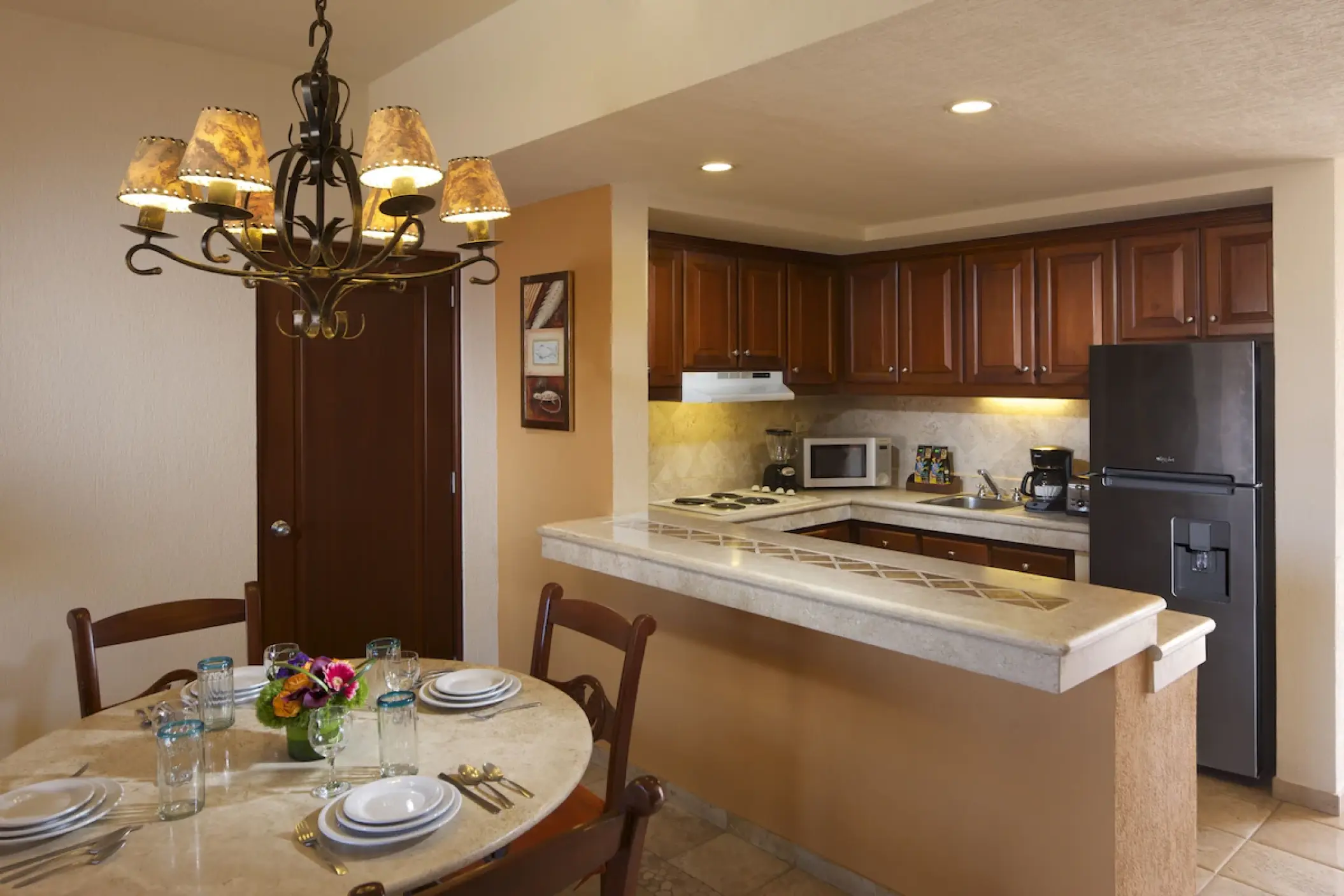 Playa Grande Resort suite dining area and kitchen, Cabo San Lucas