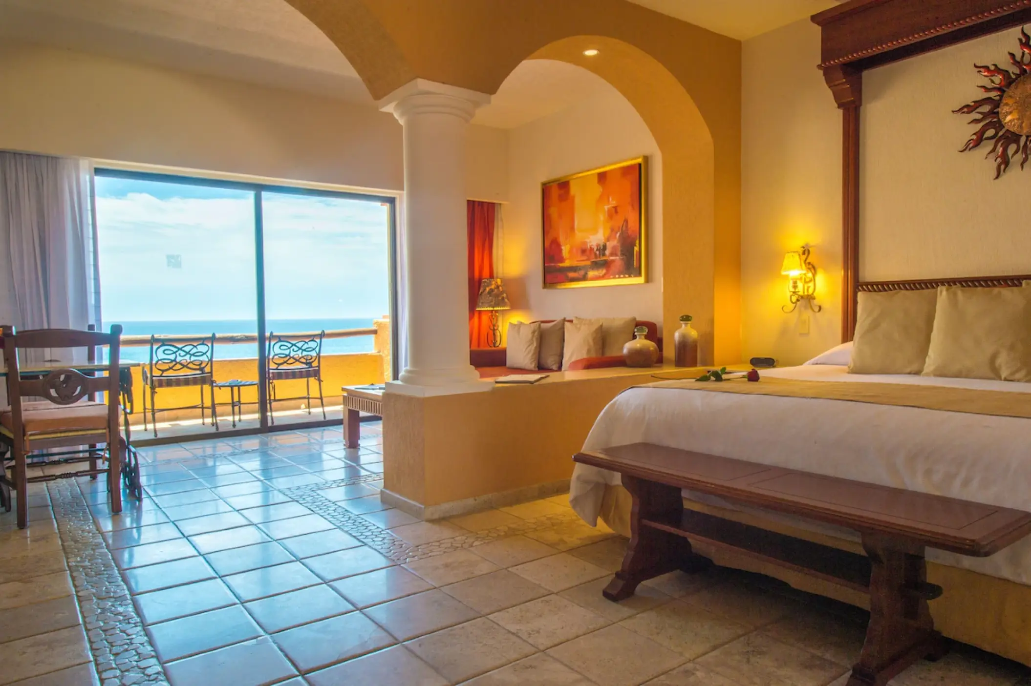 Ocean view suite with a private balcony and arches at Playa Grande Resort, Cabo San Lucas