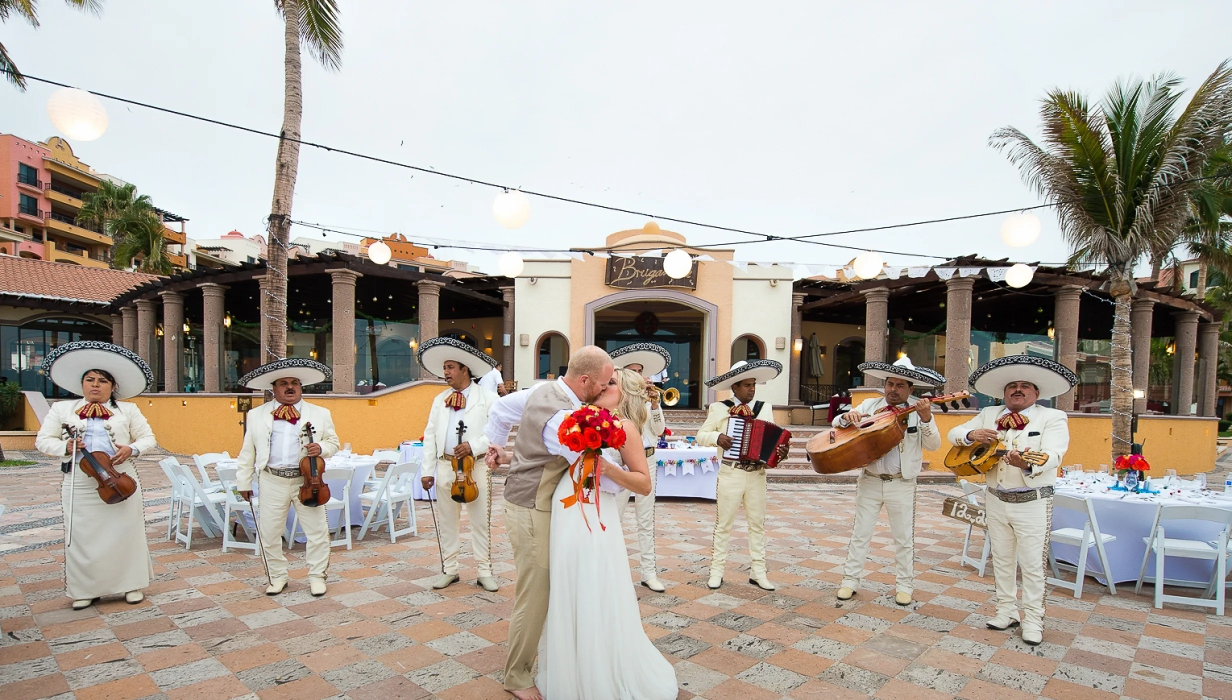 Couple with mariachi band at playa grande resort and grand spa