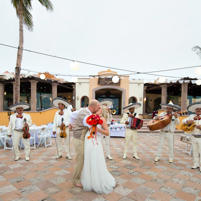 Couple with mariachi band at playa grande resort and grand spa