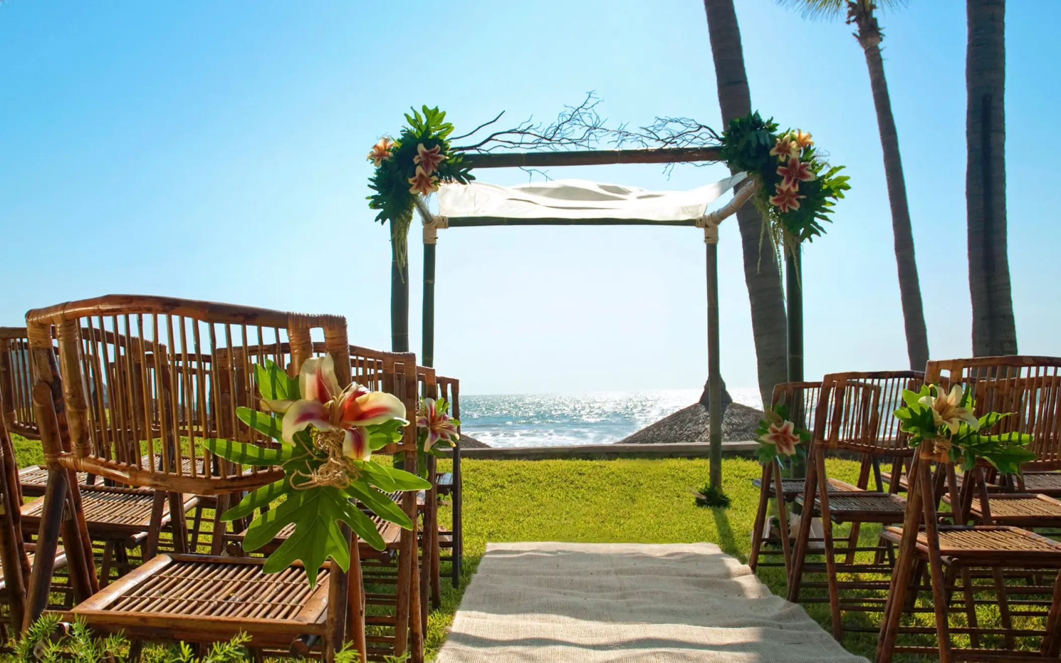 Oceanfront wedding ceremony setup with a bamboo huppah at Pueblo Bonito Los Cabos, Cabo San Lucas