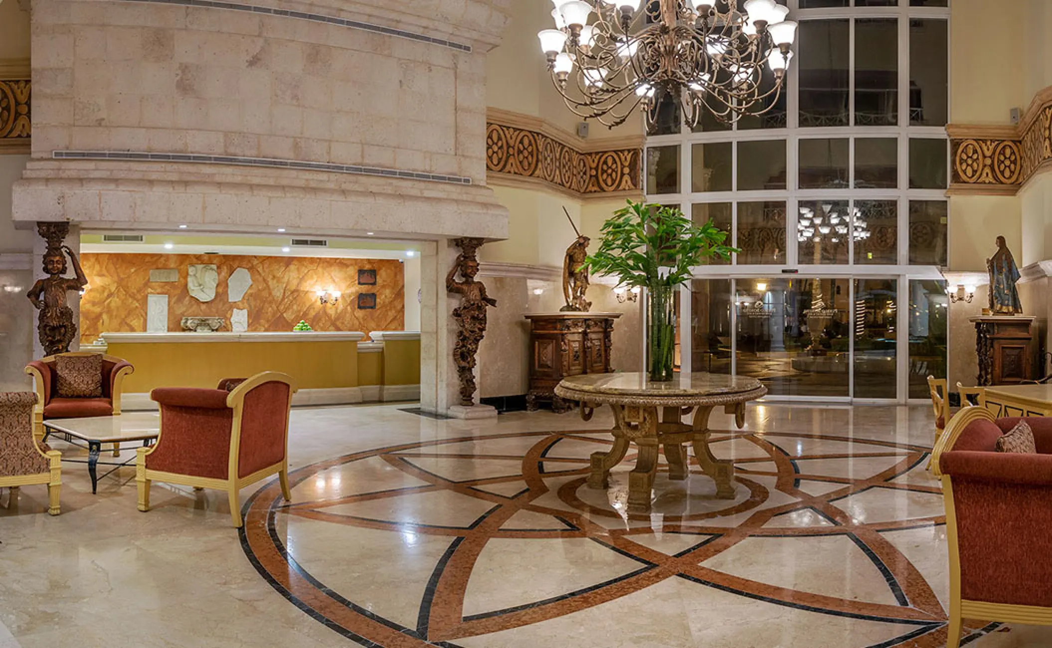 Grand lobby entrance with chandelier and ornate floor tile at Pueblo Bonito Rose, Cabo San Lucas