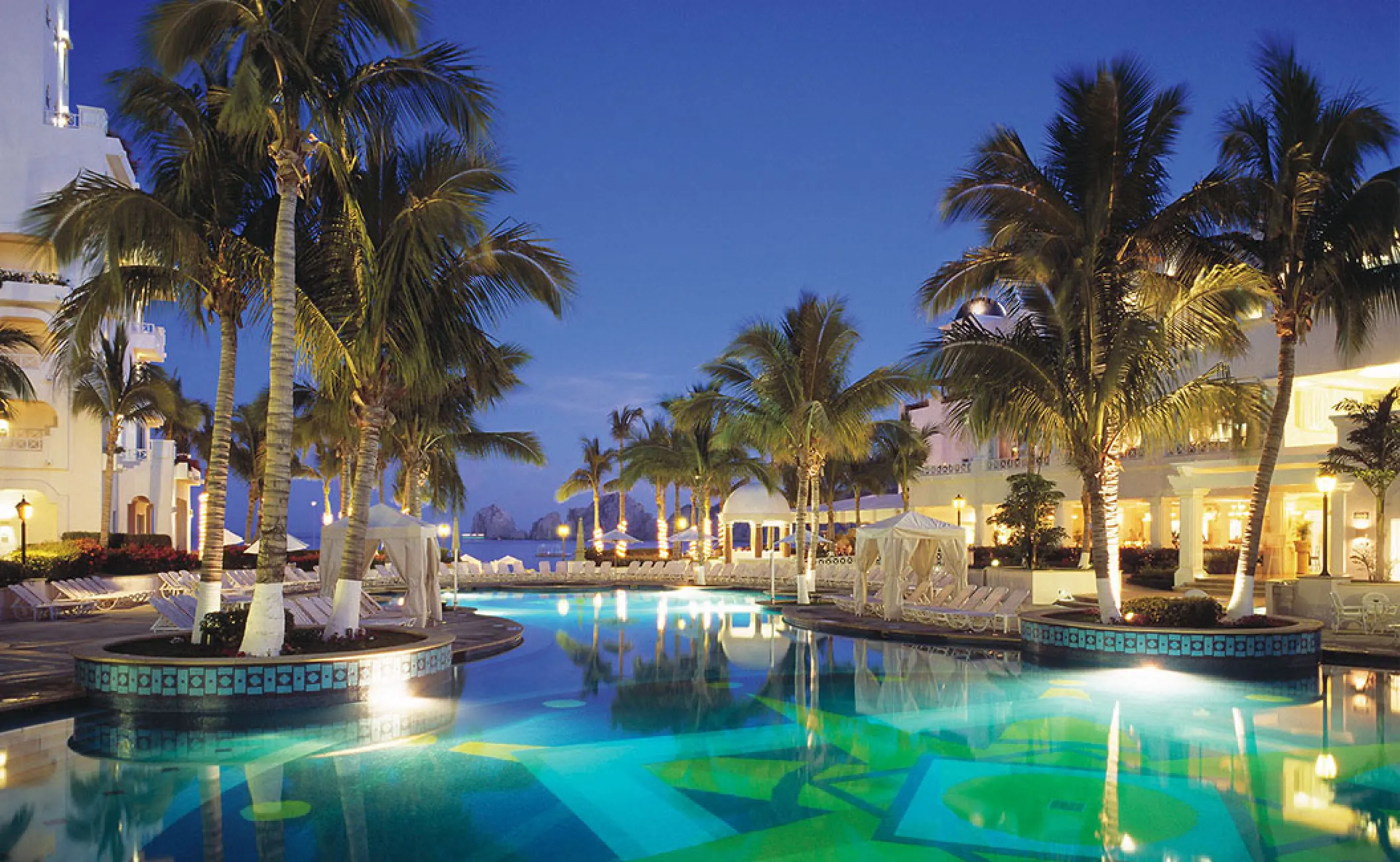 Pueblo Bonito Rose swimming pool lit up at night, Cabo San Lucas