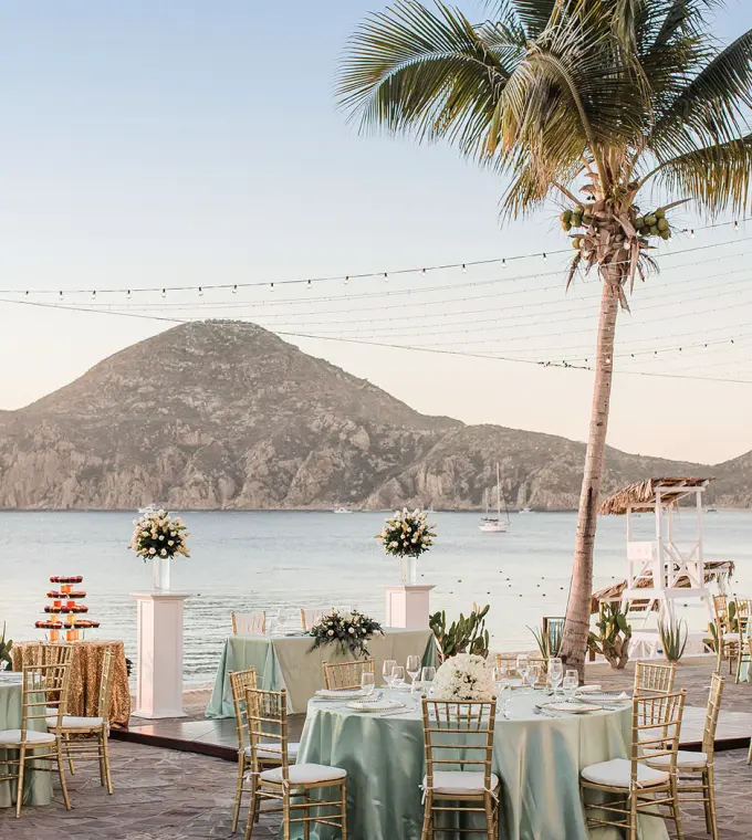 Outdoor wedding reception with mint green linens at Pueblo Bonito Los Cabos, Cabo San Lucas