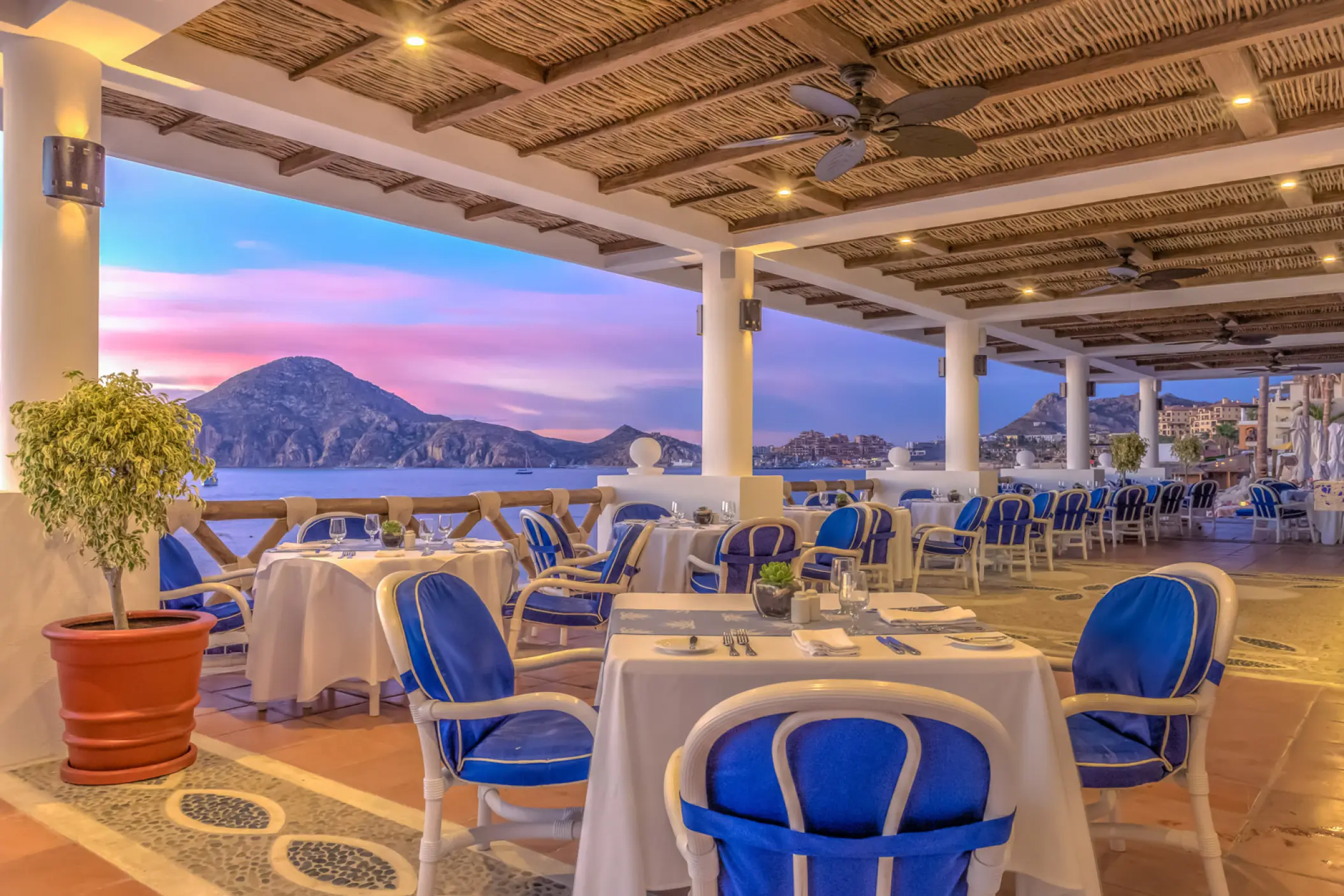 Outdoor restaurant at Pueblo Bonito Los Cabos overlooking the Sea of Cortez at sunset, Cabo San Lucas