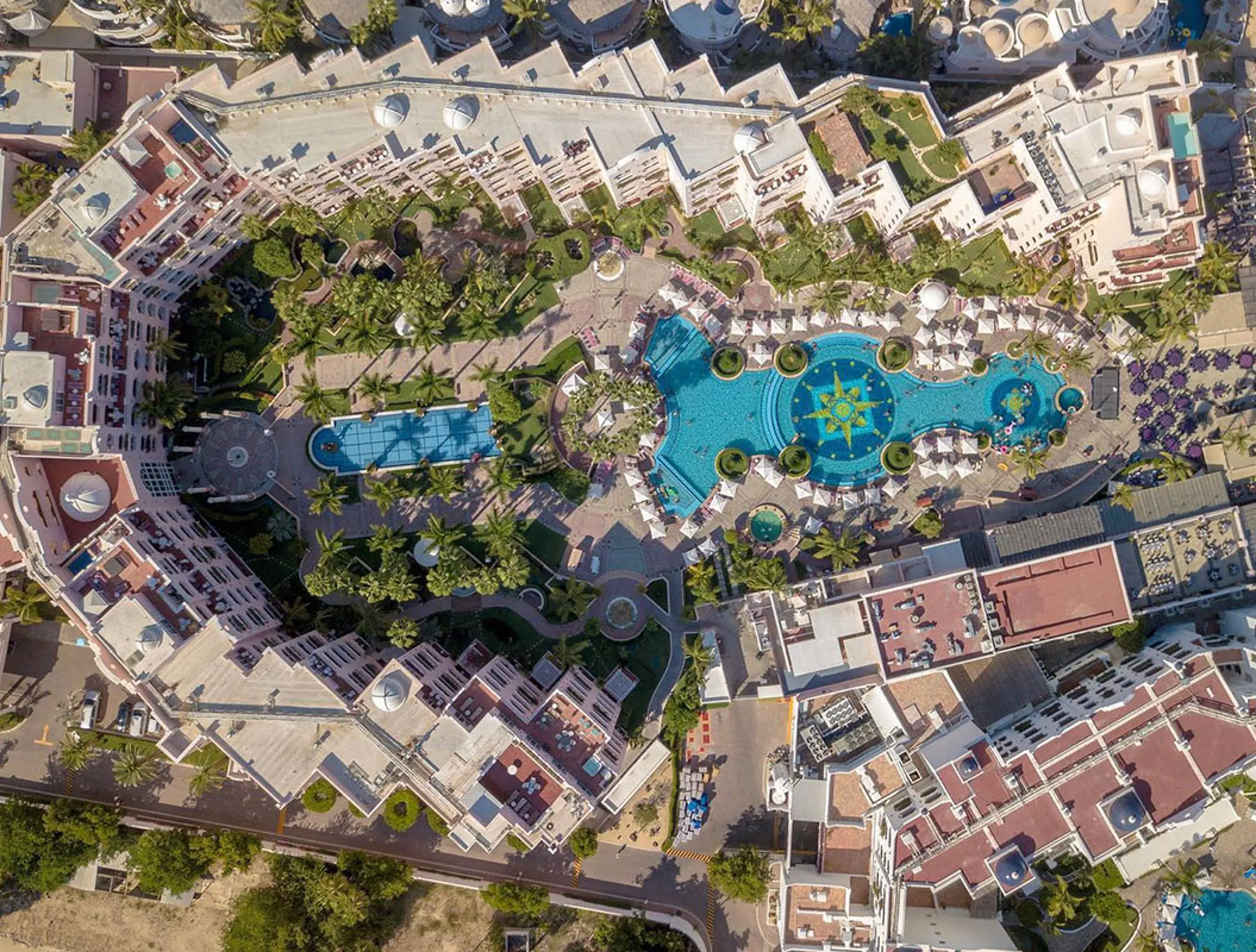 Aerial drone view of the pool and grounds at Pueblo Bonito Rose, Cabo San Lucas