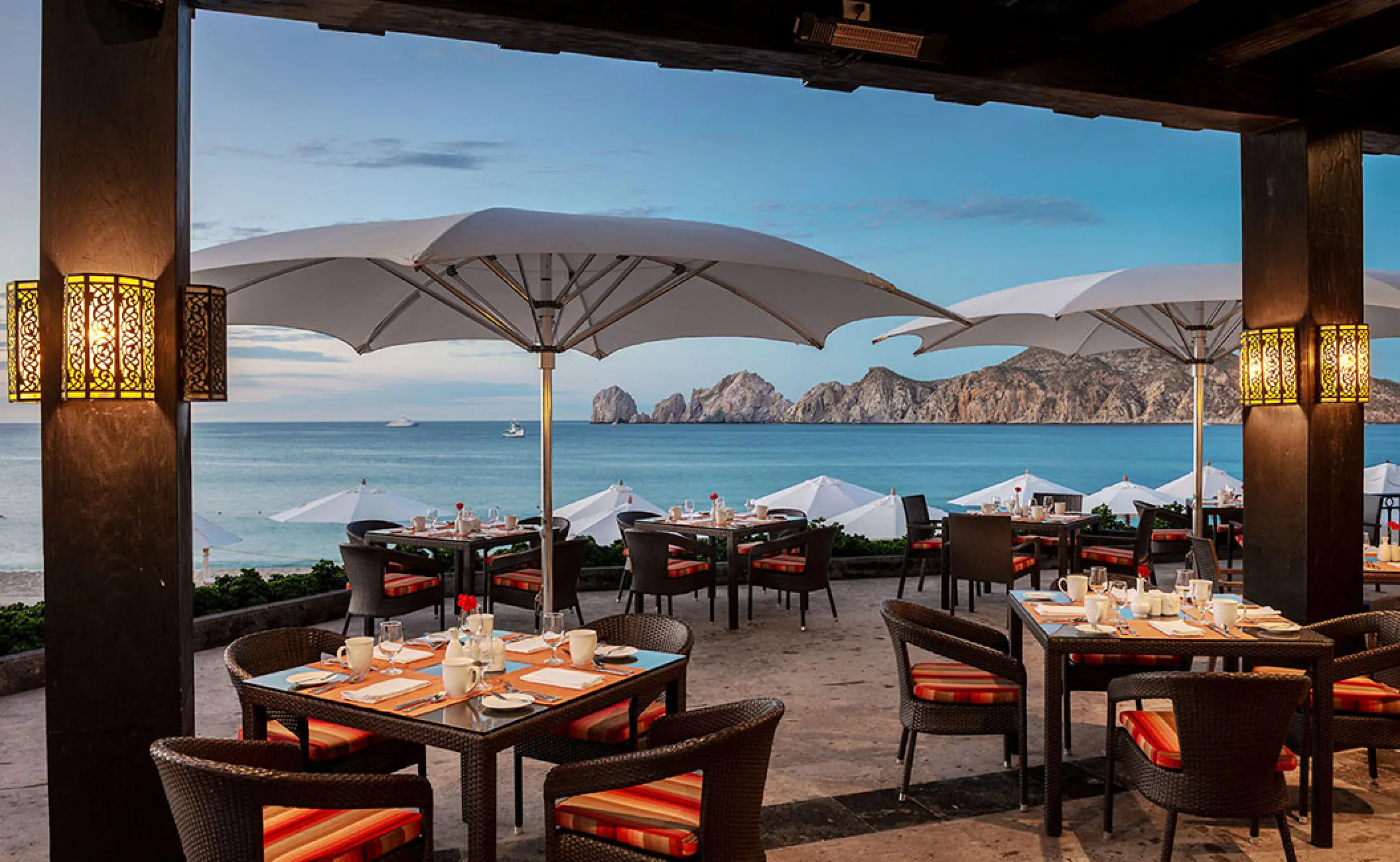 Outdoor terrace dining with ocean views at Pueblo Bonito Rose, Cabo San Lucas