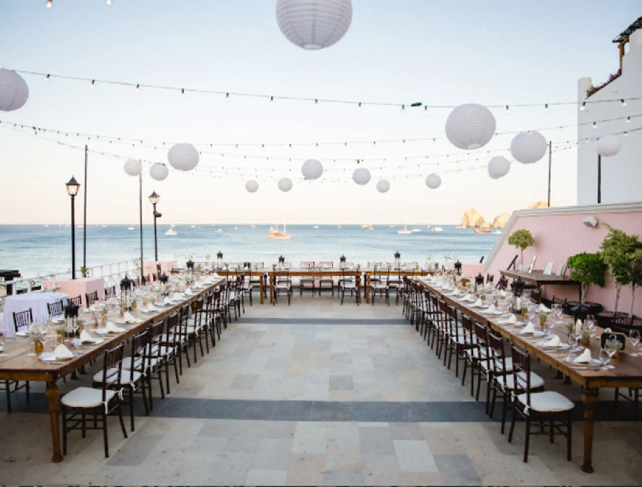 Bella Vita Terrace wedding reception with white lanterns at Pueblo Bonito Rose, Cabo San Lucas