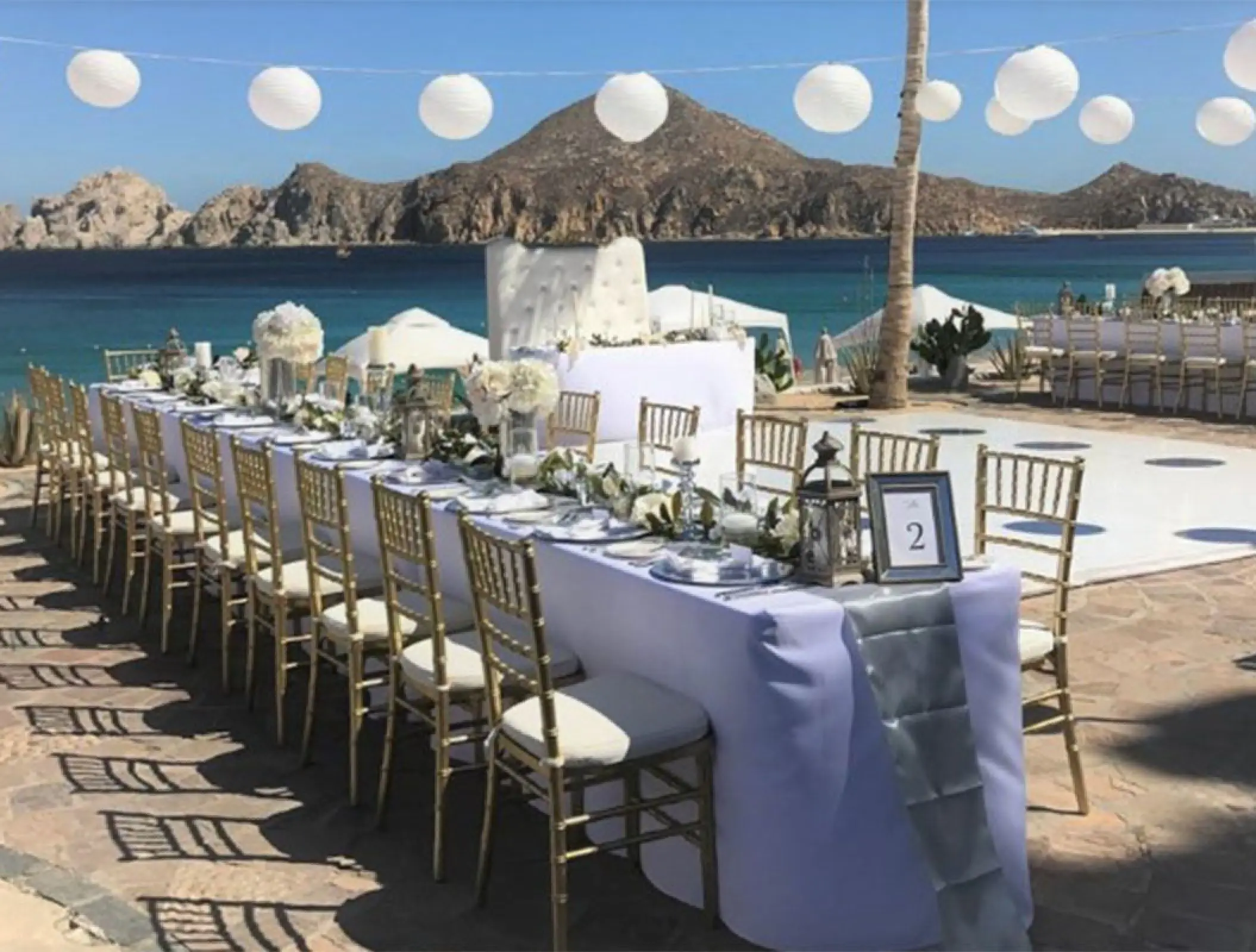 Terrace wedding reception at Pueblo Bonito Rose with ocean and mountain views, Cabo San Lucas