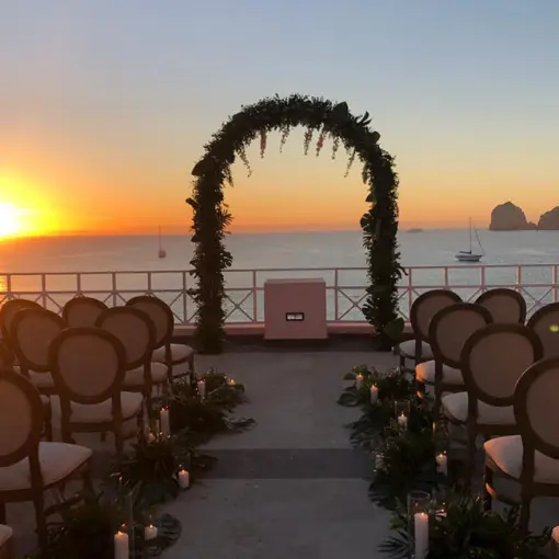 Terrace wedding ceremony setup at sunset at Pueblo Bonito Rose, Cabo San Lucas