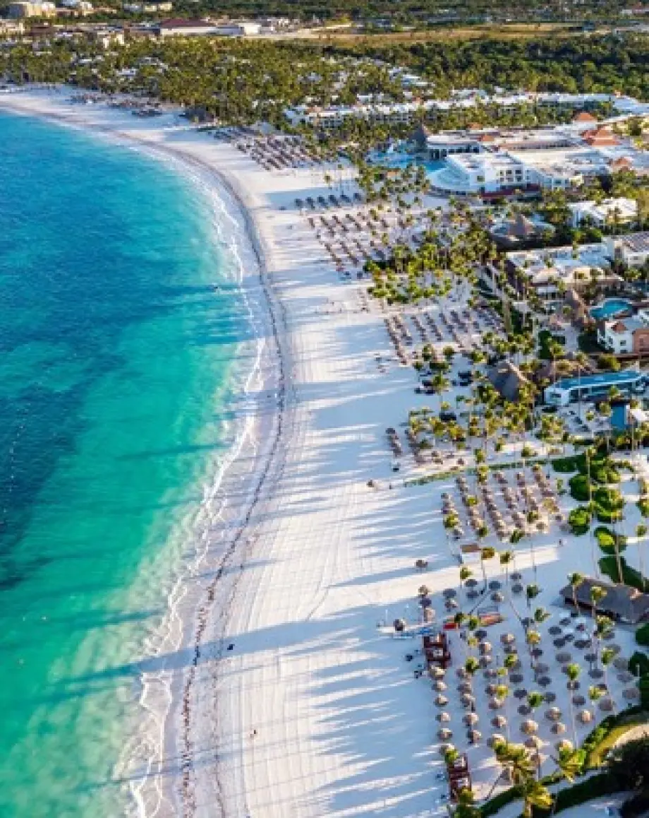 Aerial view of white sand beach and turquoise water at a Punta Cana resort