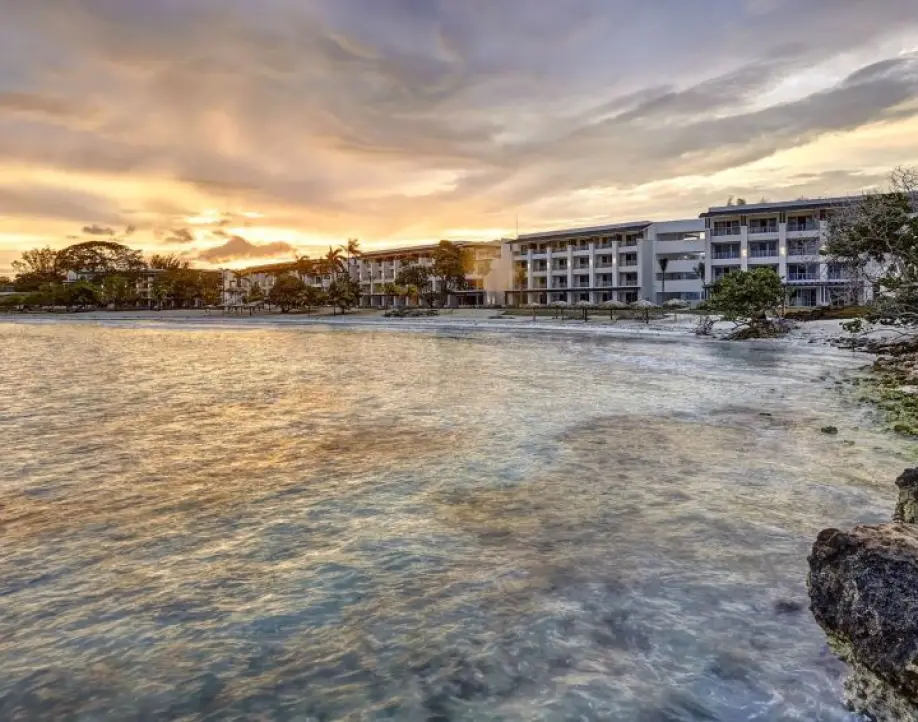 Sunset over the coastline and beach resorts in Negril, Jamaica