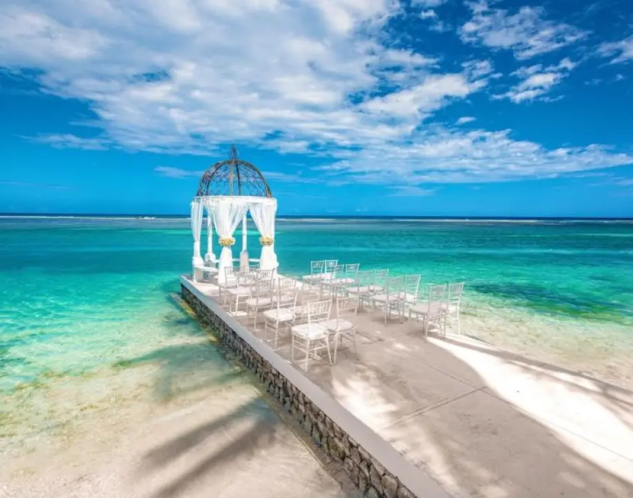 Oceanfront wedding ceremony gazebo and seating on a jetty in Lucea, Jamaica